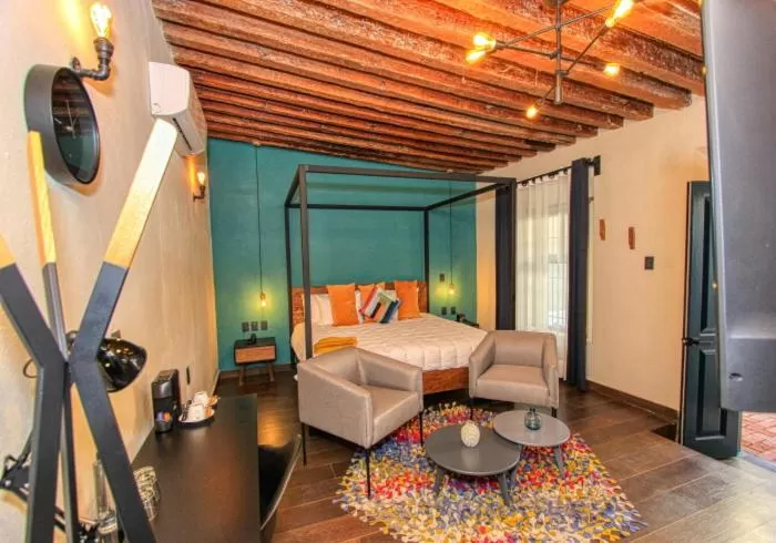 Bed in Antigua Trece Hotel Fusión