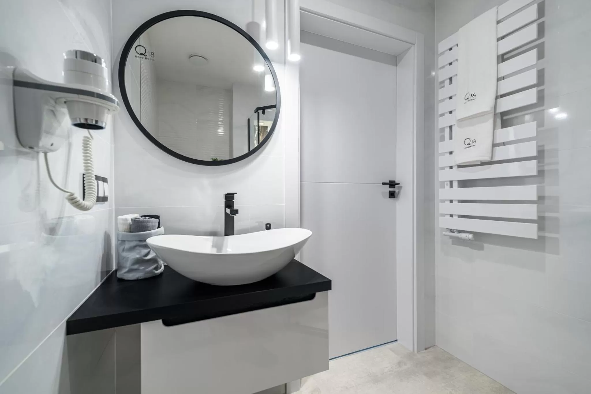 Bathroom in Q18 ApartHotel