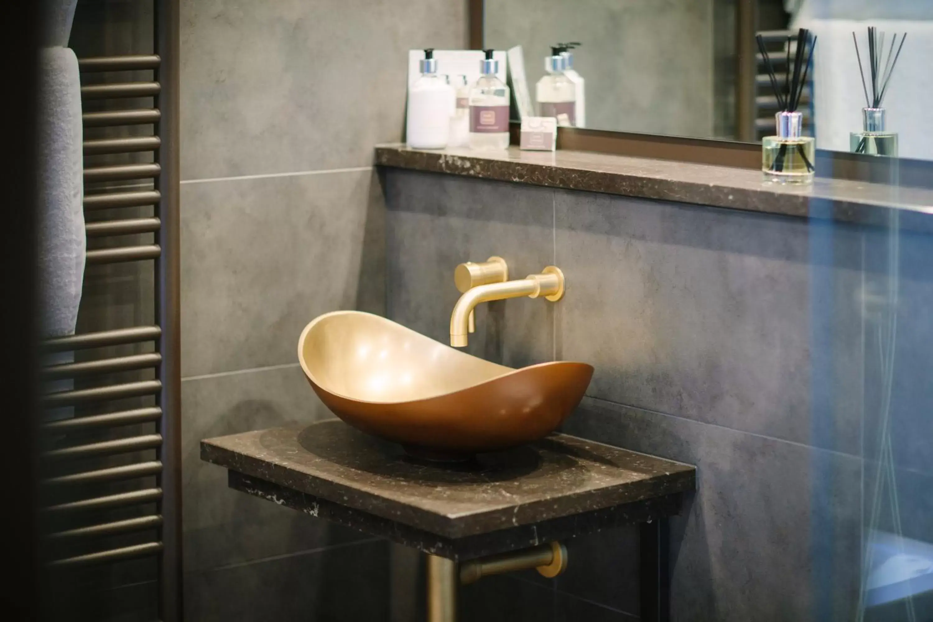 Bathroom in Absoluxe Suites