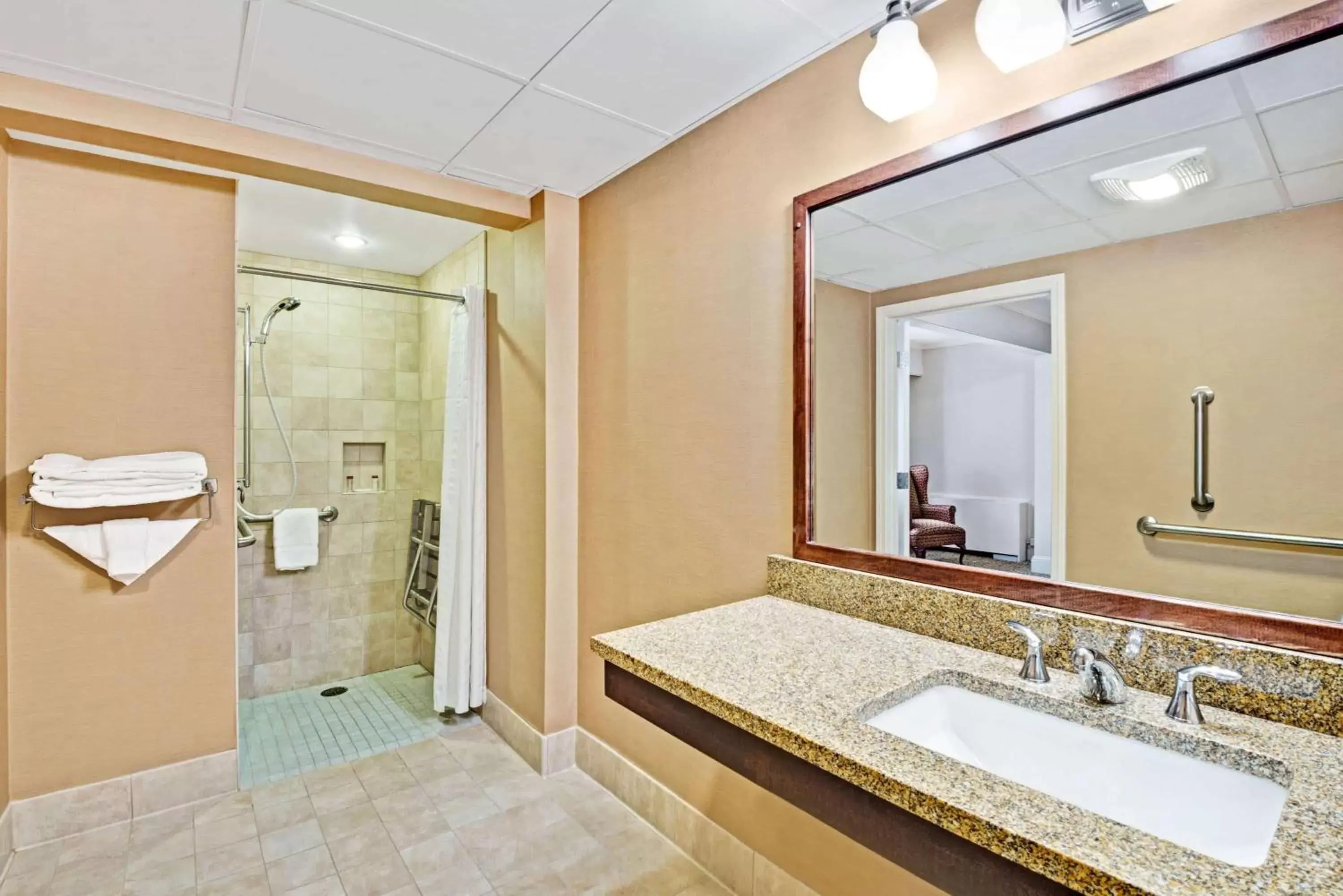 Bathroom in Ramada by Wyndham Seekonk Providence Area