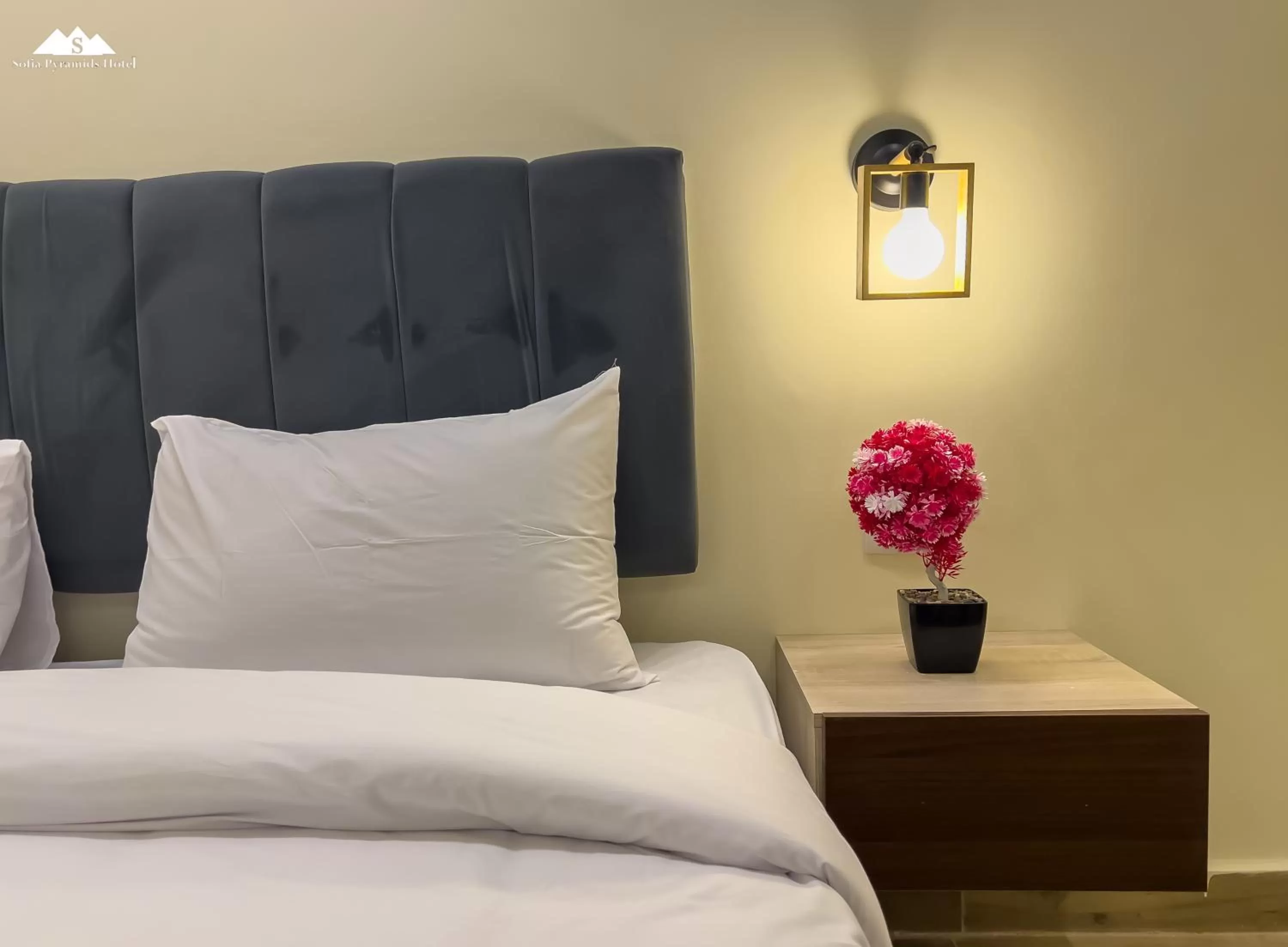 Bed in Sofia Pyramids Hotel