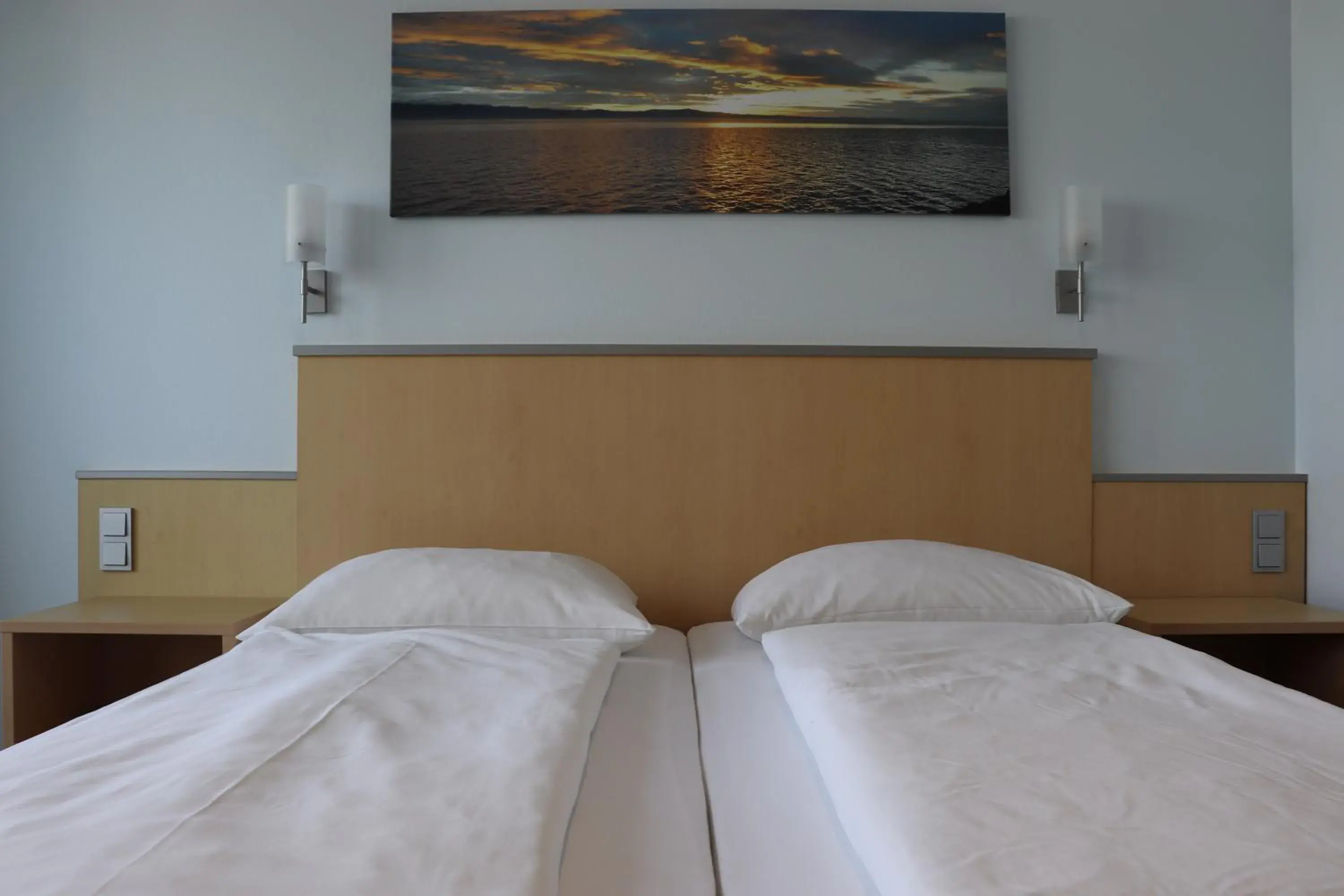 Bed in Bodensee Yachthotel Schattmaier