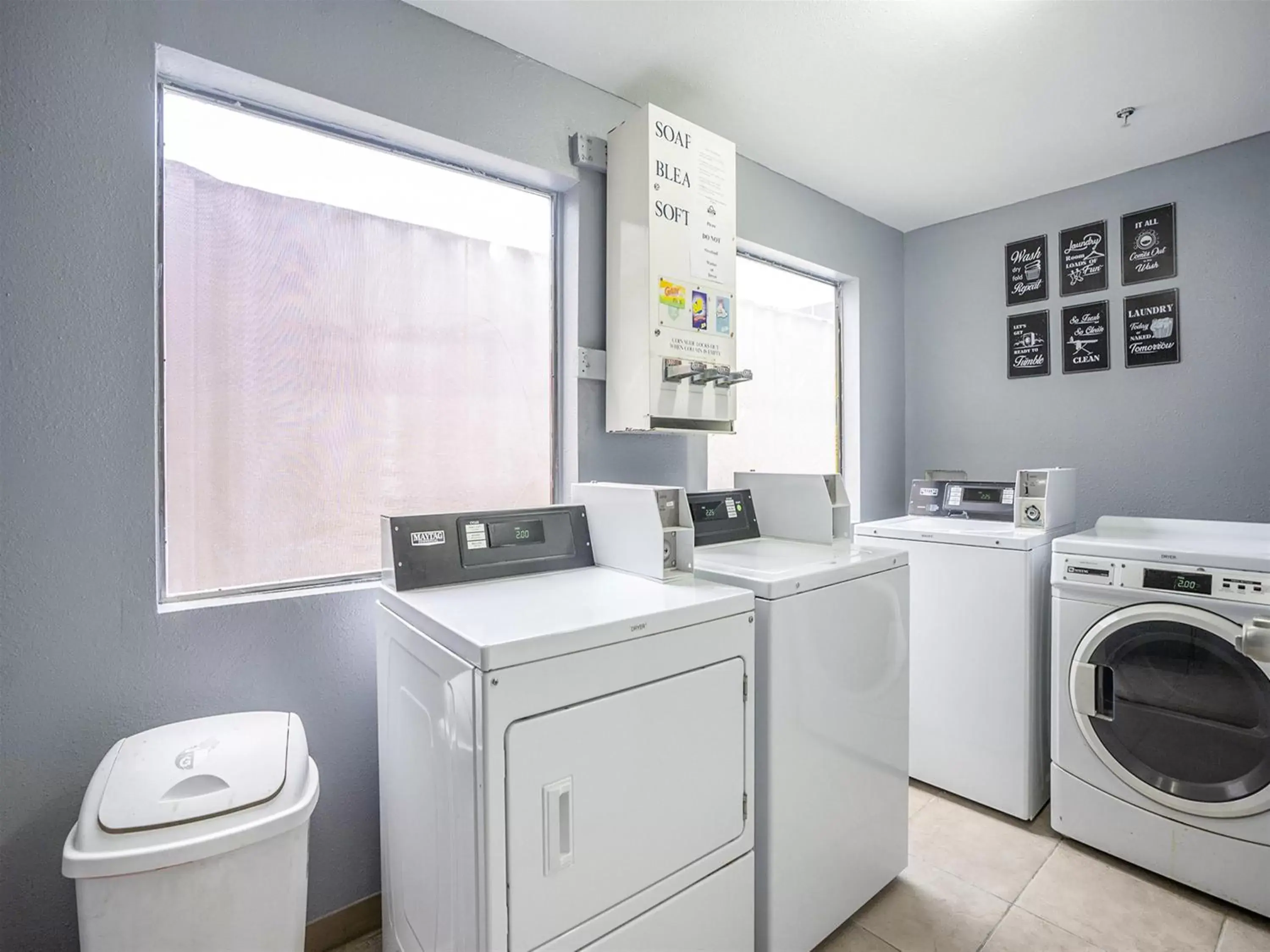 laundry, Kitchen/Kitchenette in Days Inn & Suites by Wyndham Webster NASA-ClearLake-Houston