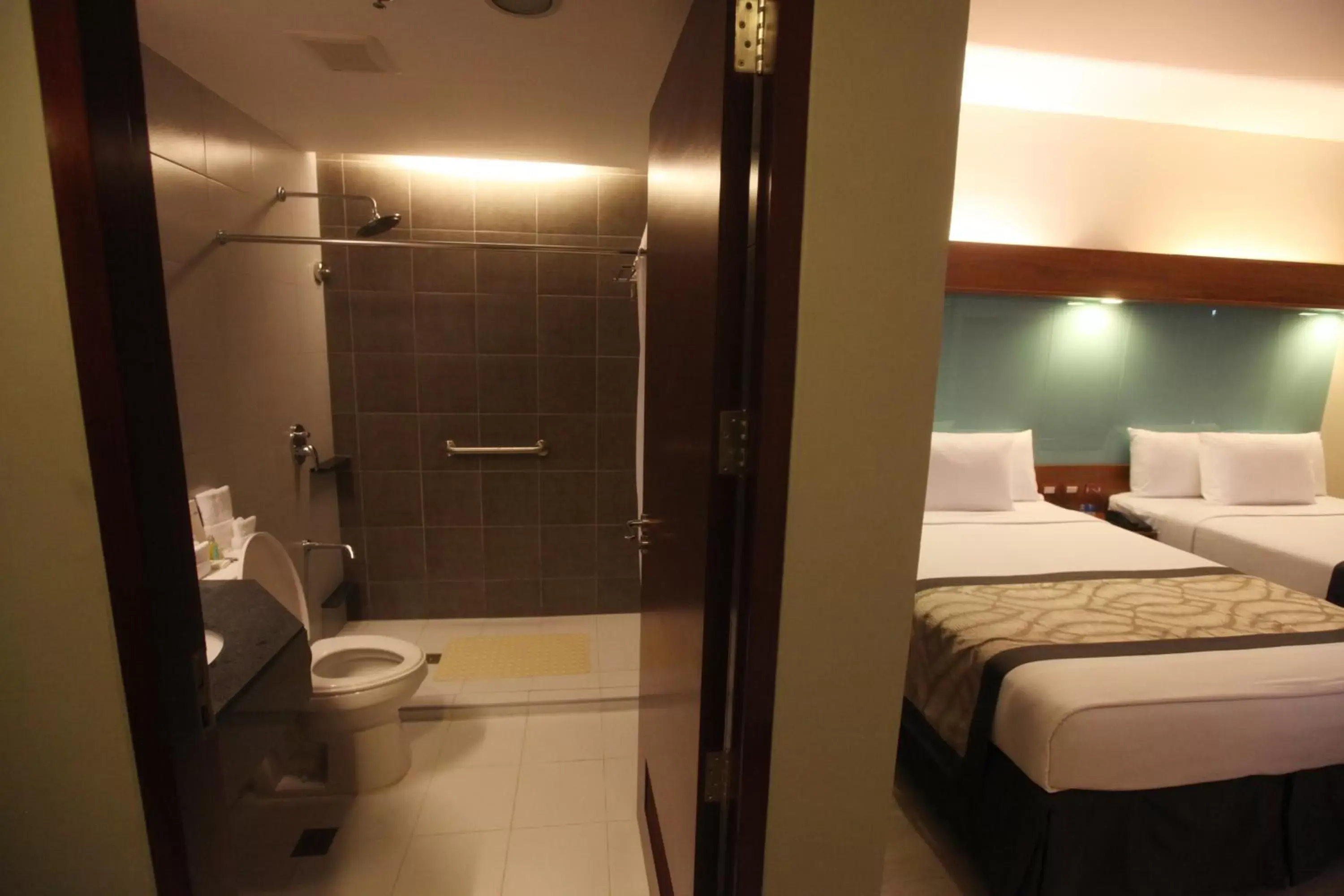 Toilet, Bed in Microtel by Wyndham UP Technohub Toilet, Bed in Microtel by Wyndham UP Technohub