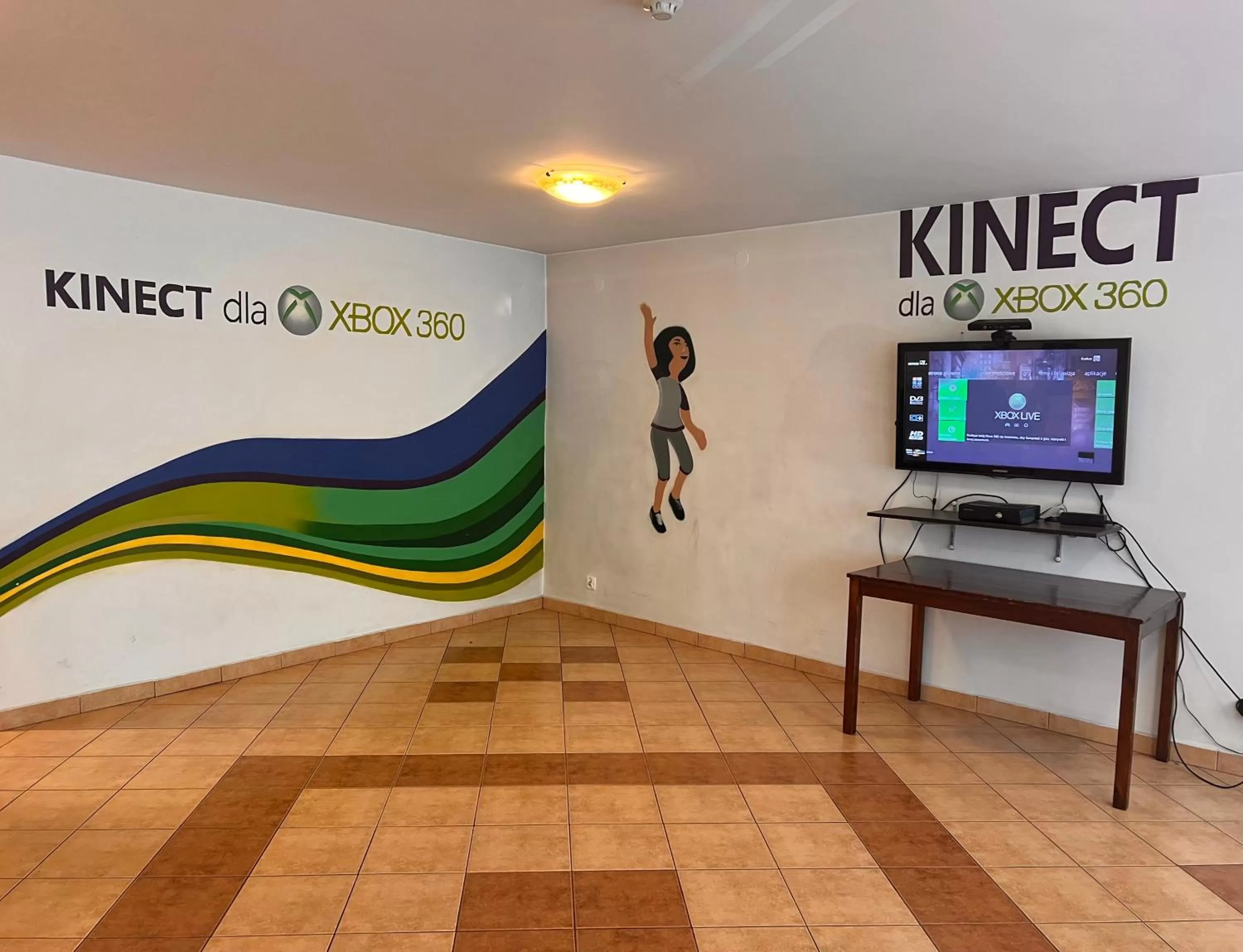 Communal lounge/ TV room, TV/Entertainment Center in Hotel ROK