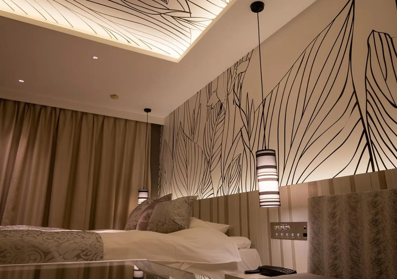 Bed in HOTEL U's Kouroen