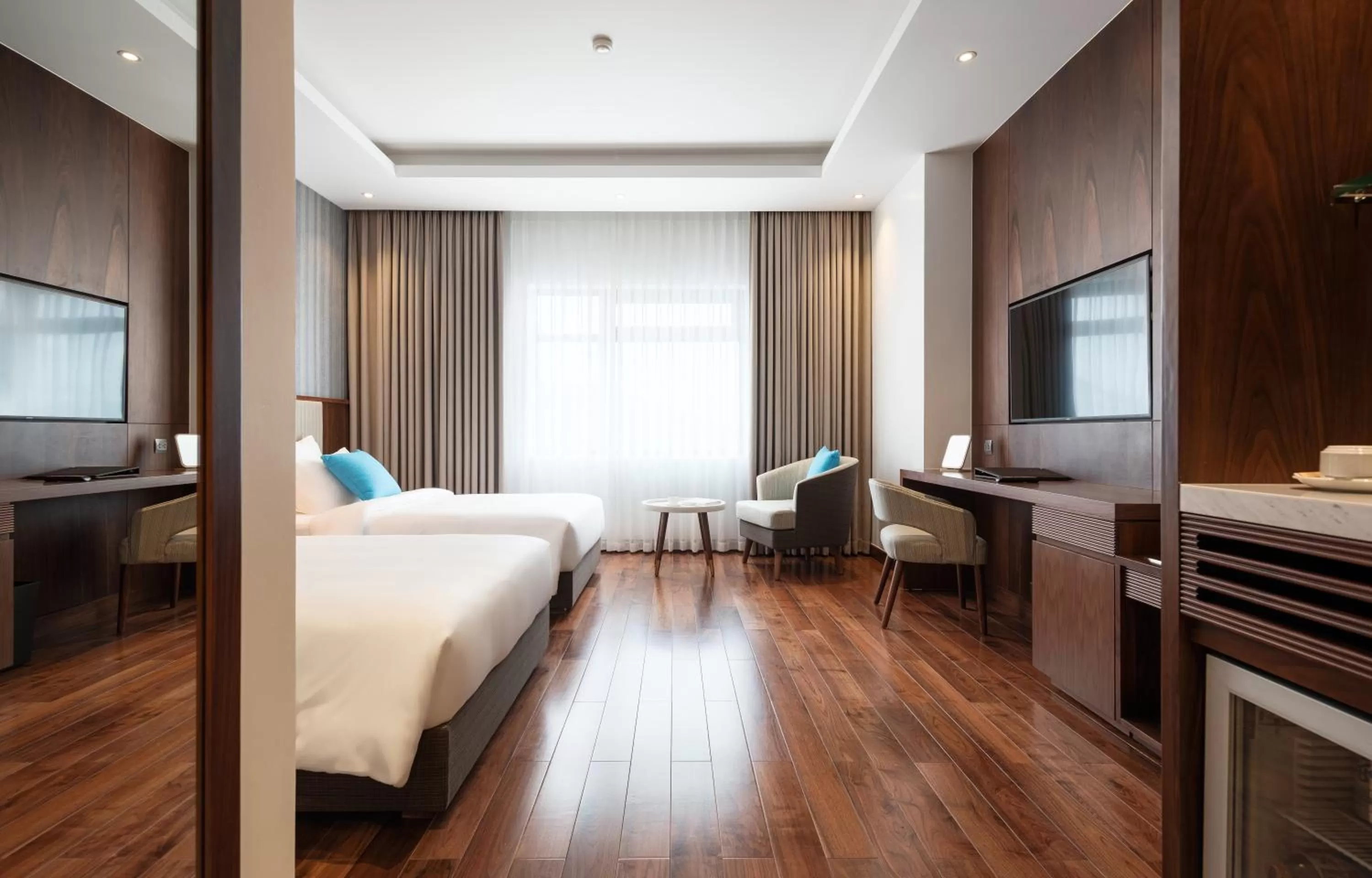 Photo of the whole room, Bed in D'Lecia Ha Long Hotel