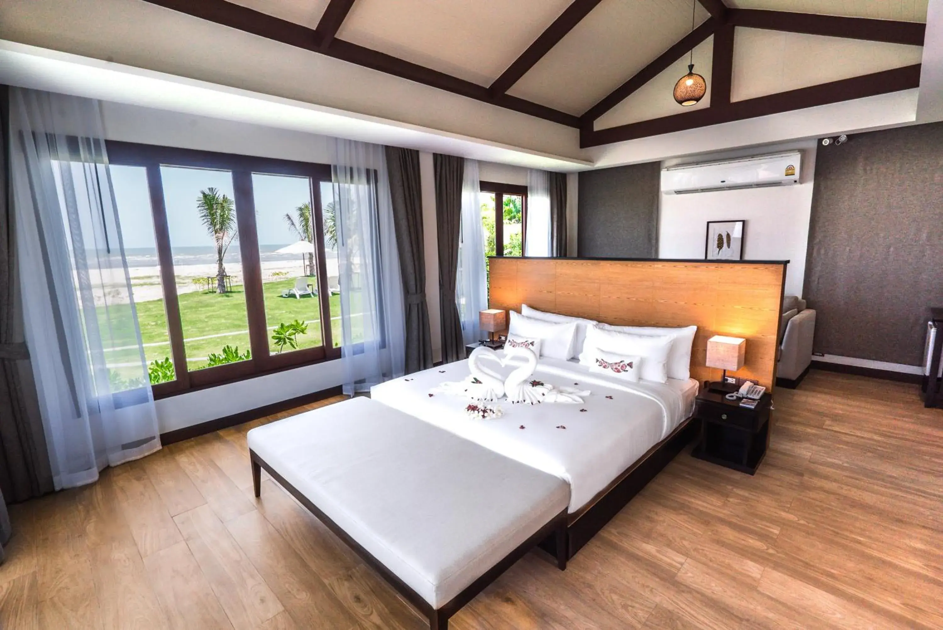 Bed in Triple Tree Beach Resort