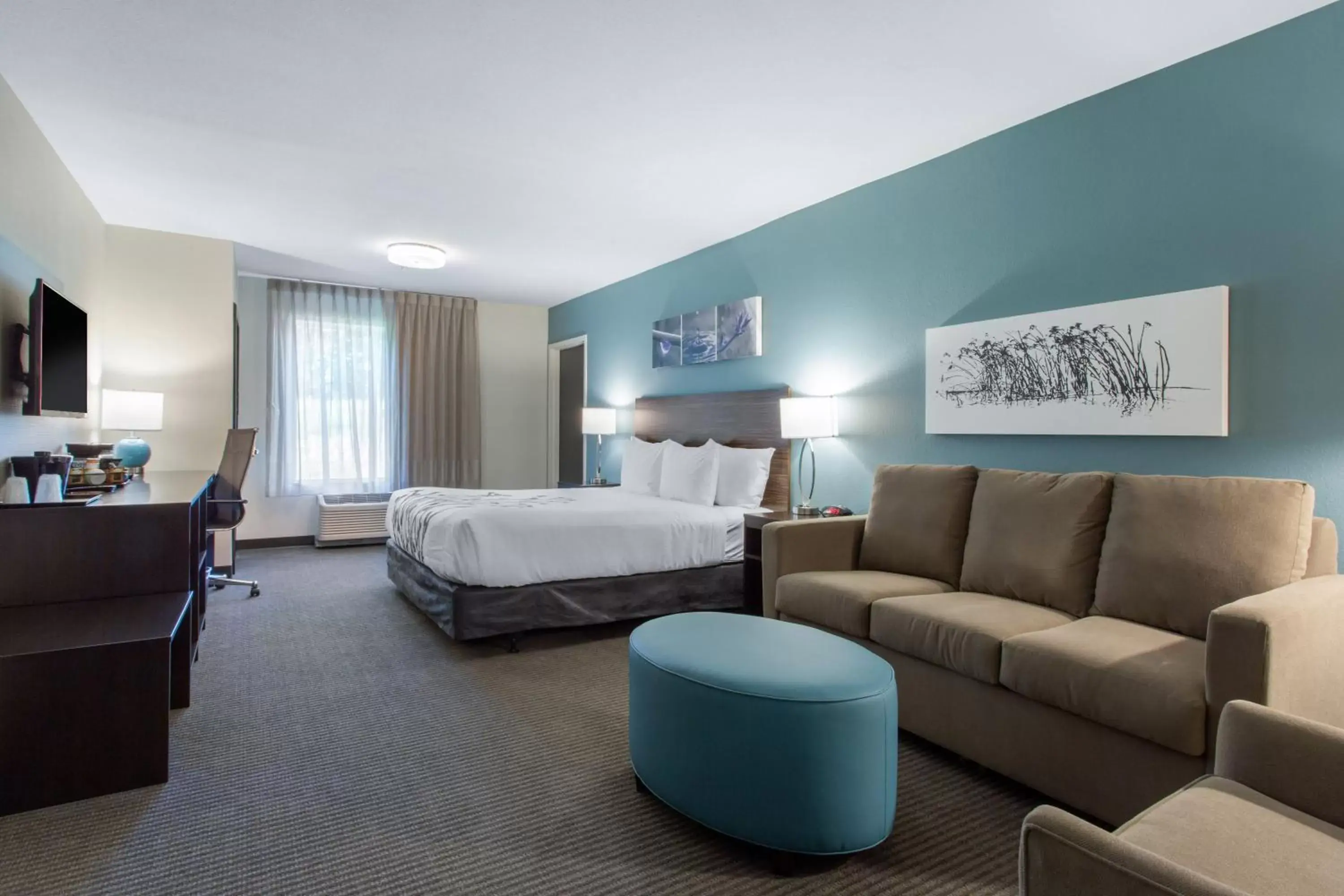 Bed, Seating Area in Sleep Inn & Suites Monroe - Woodbury
