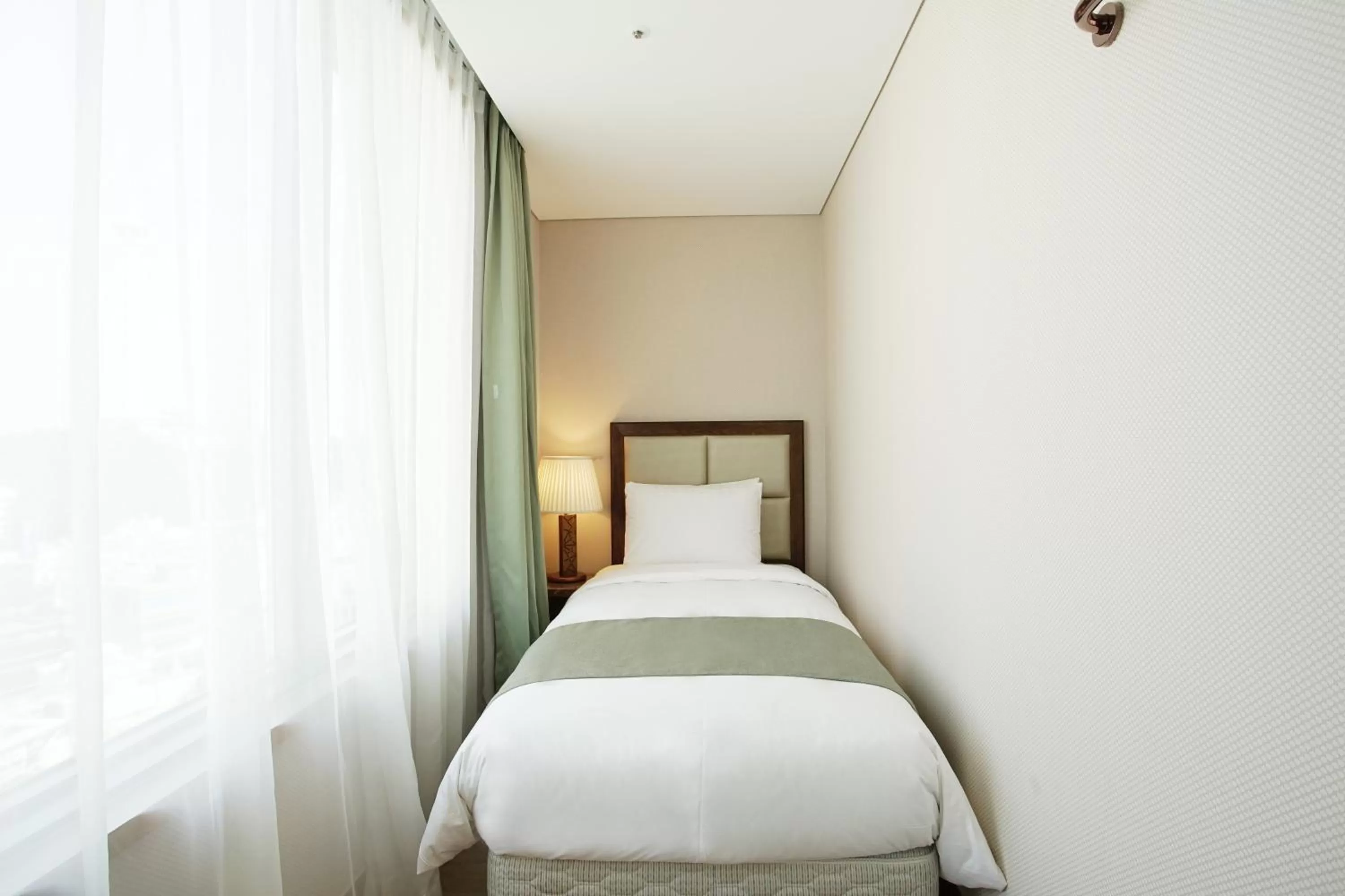 Bed in Stanford Hotel Busan