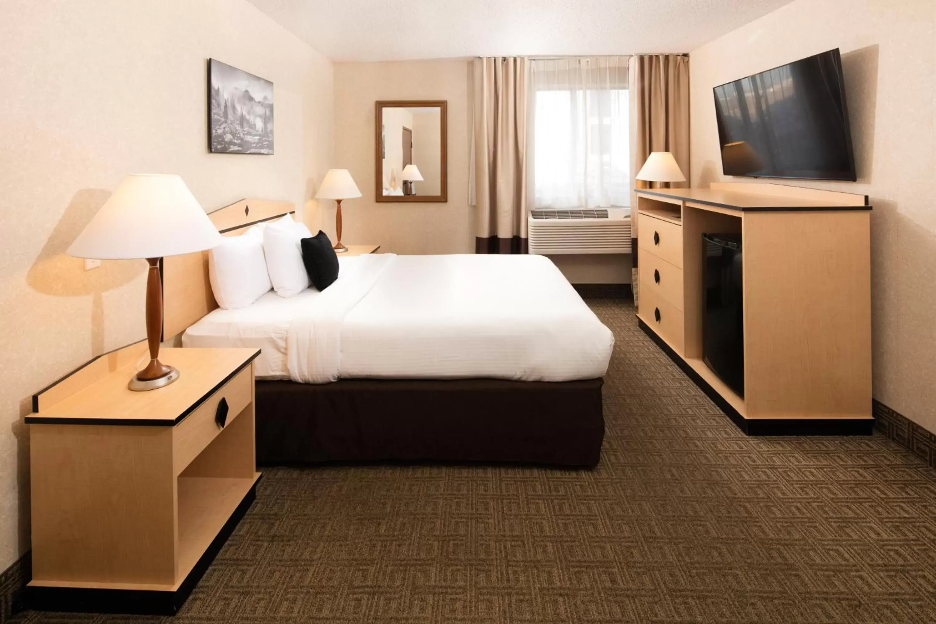 Bed in SYLO Hotel Denver Airport, a Ramada by Wyndham