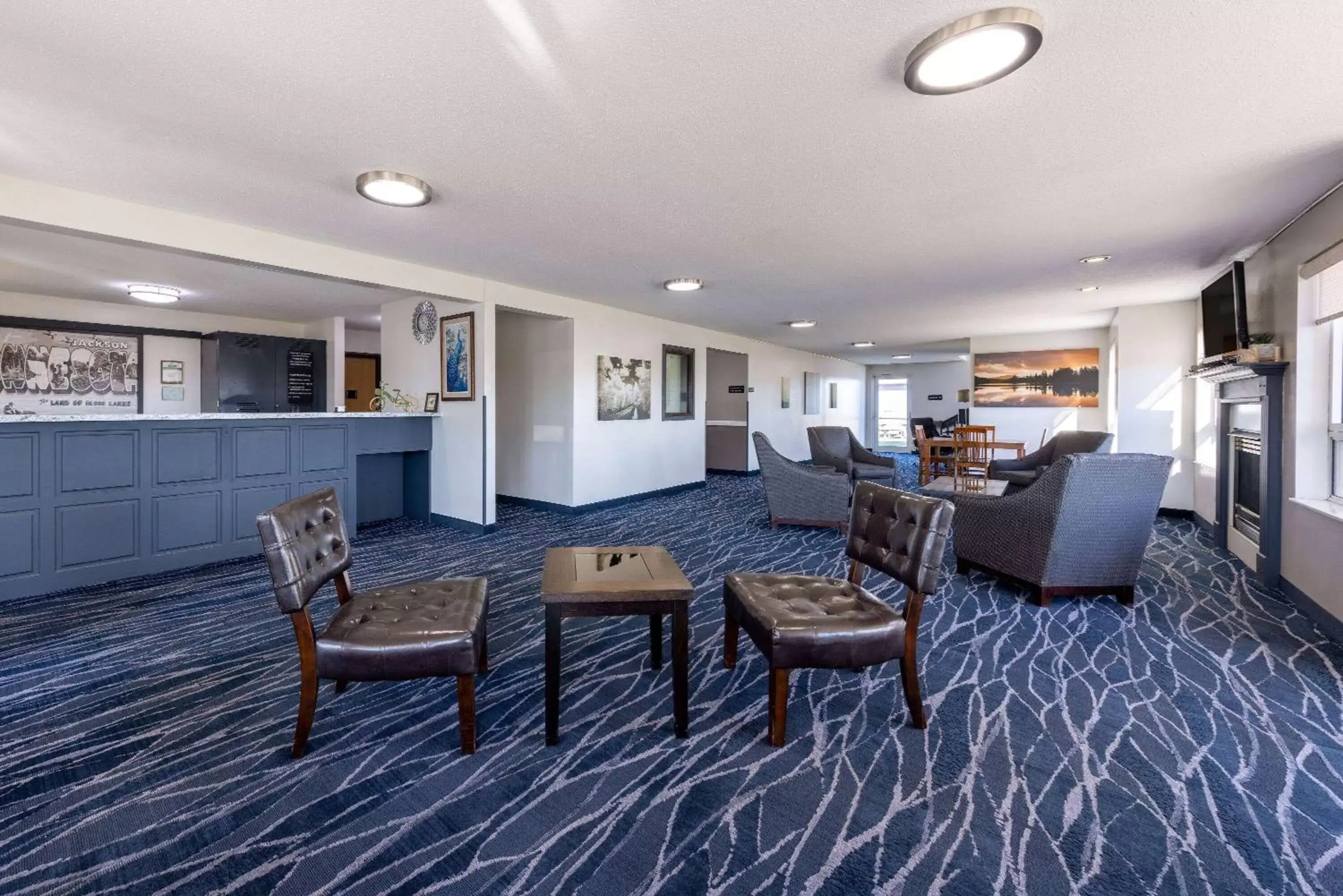 Lobby or reception, Seating Area in Super 8 by Wyndham Jackson MN