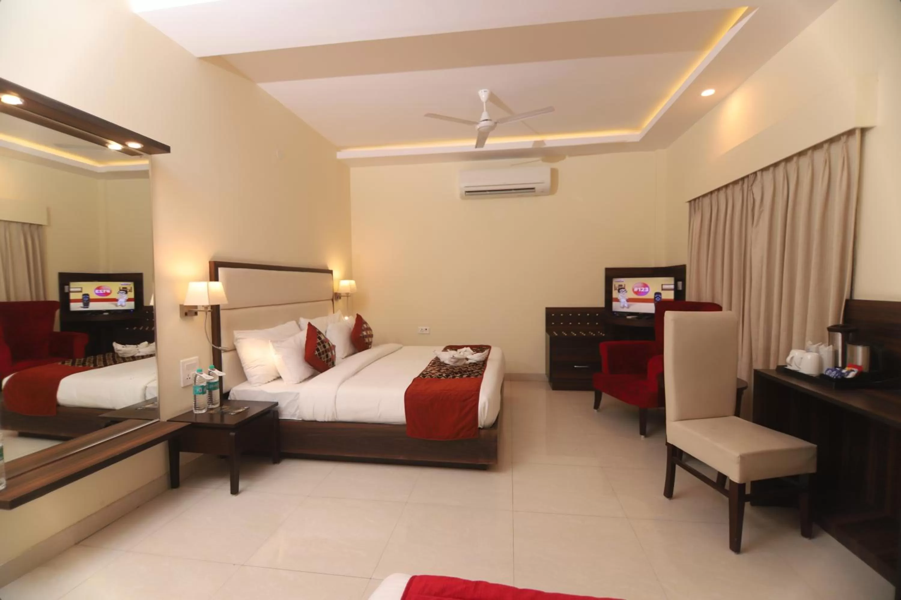 Photo of the whole room, Bed in Indira Nikunj Rubystone Exotic