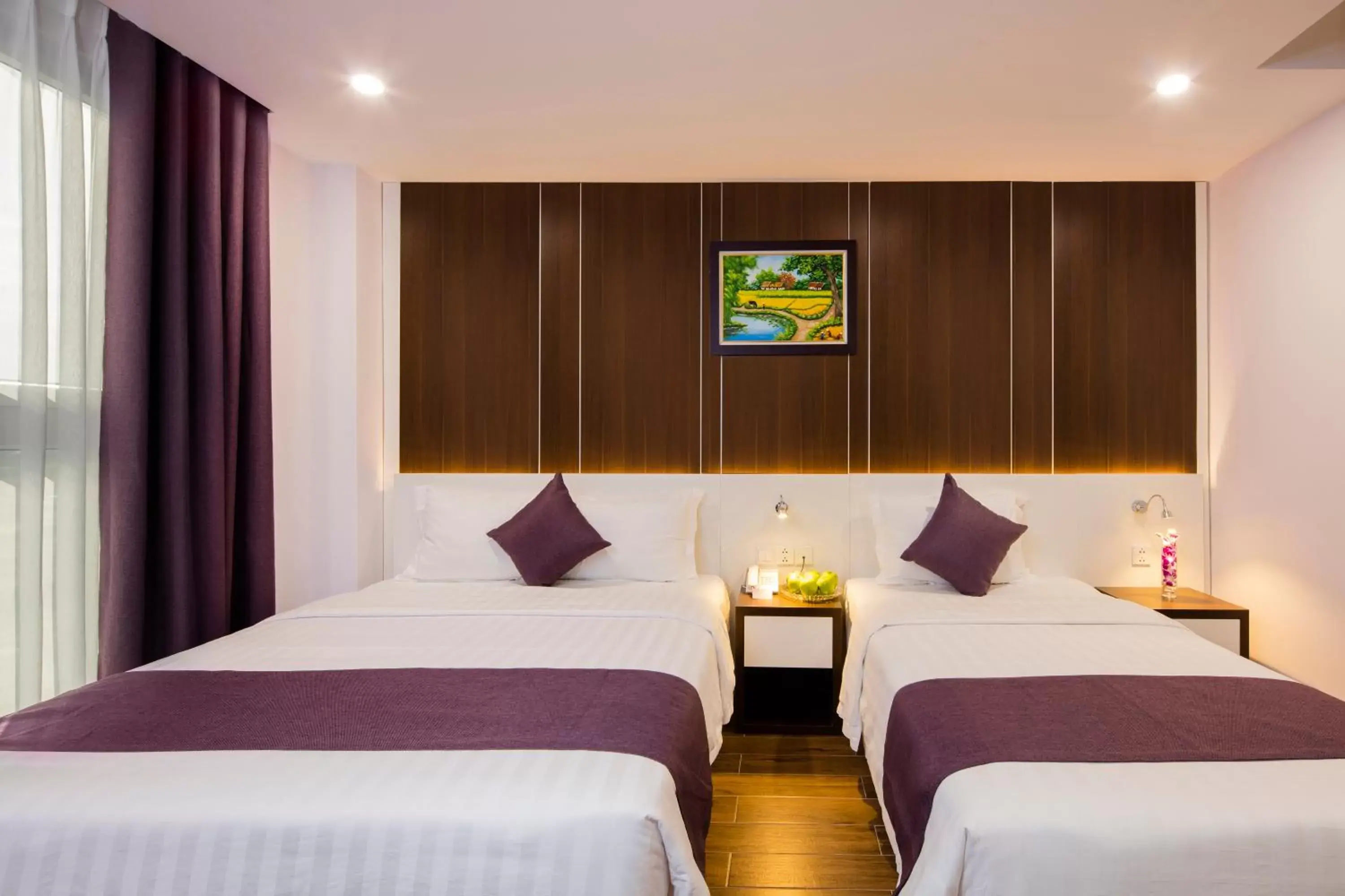 Bed in Balcony Nha Trang Hotel