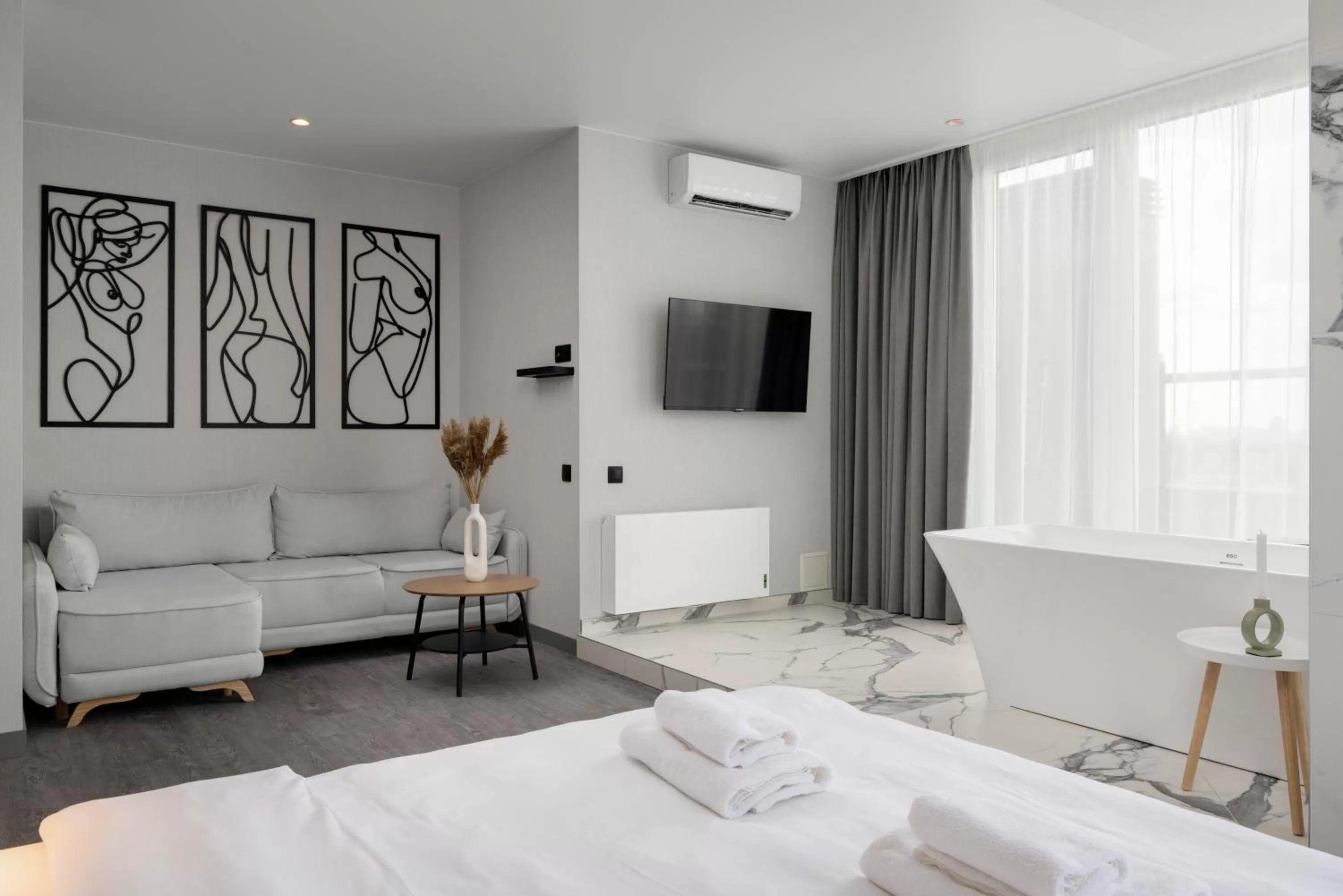 Bed, Seating Area in Be The One Hotel