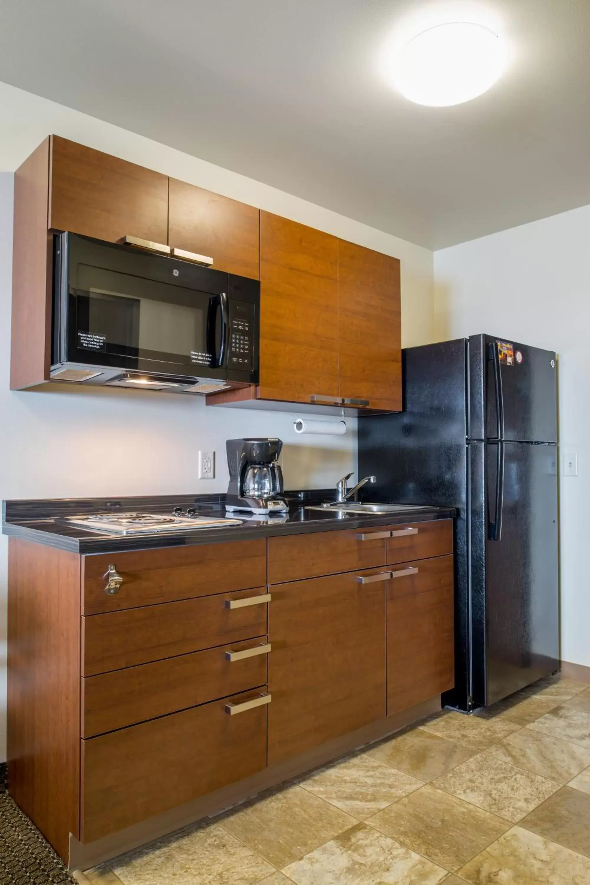 Kitchen or kitchenette, Kitchen/Kitchenette in My Place Hotel-Overland Park, KS