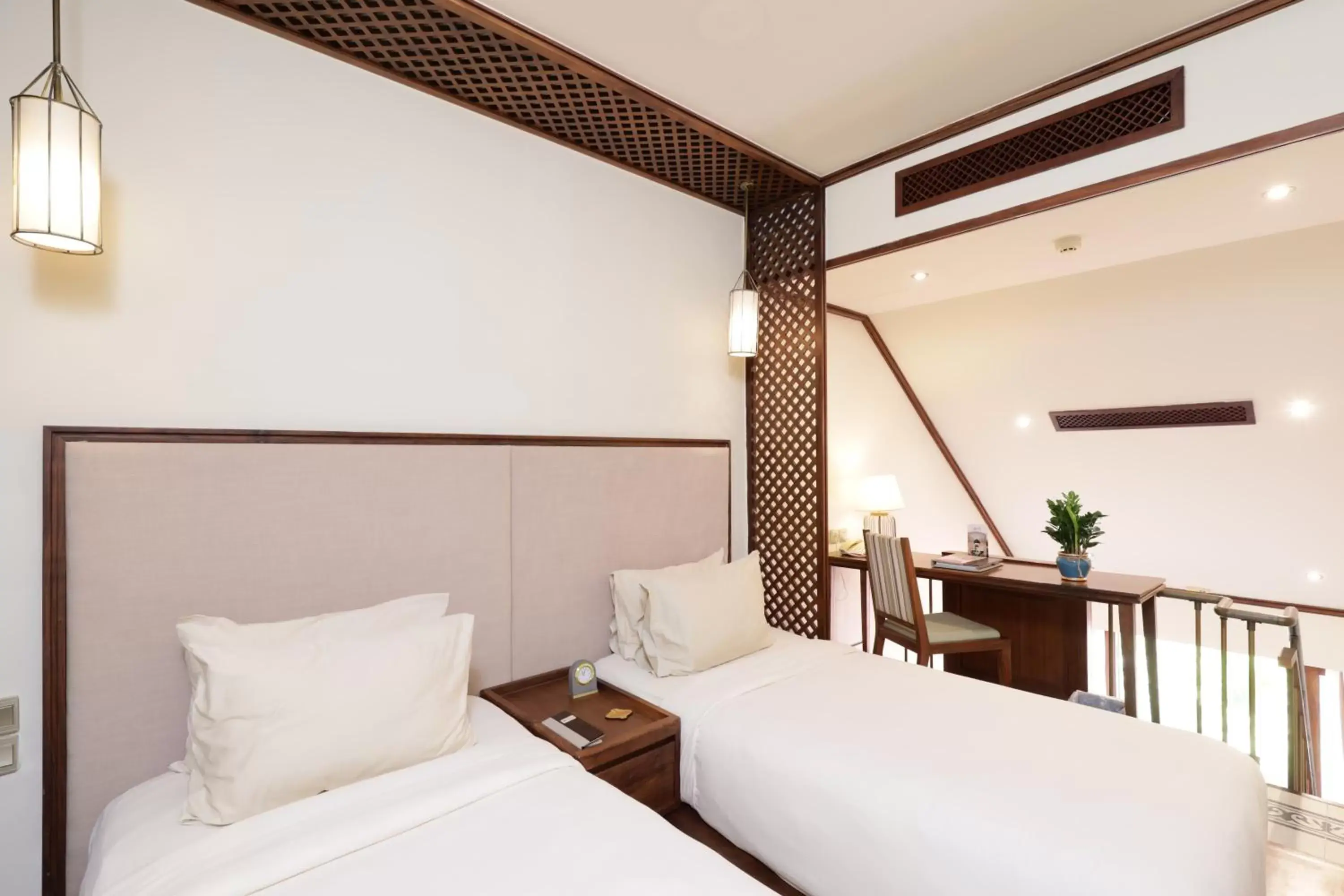 Bed in Almanity Hoi An Resort & Spa