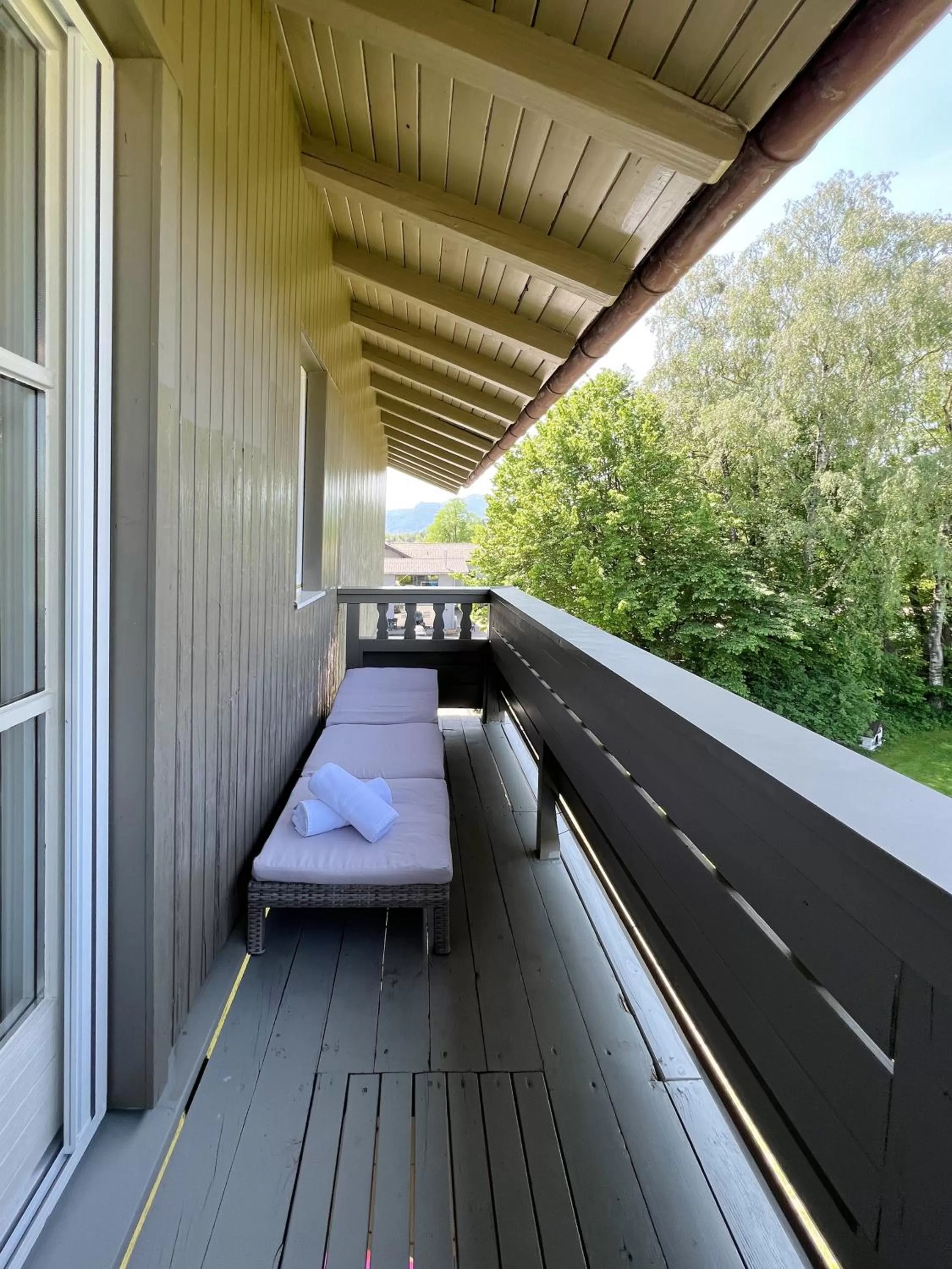 Balcony/Terrace, Bed in Hotel Schlossblick Chiemsee