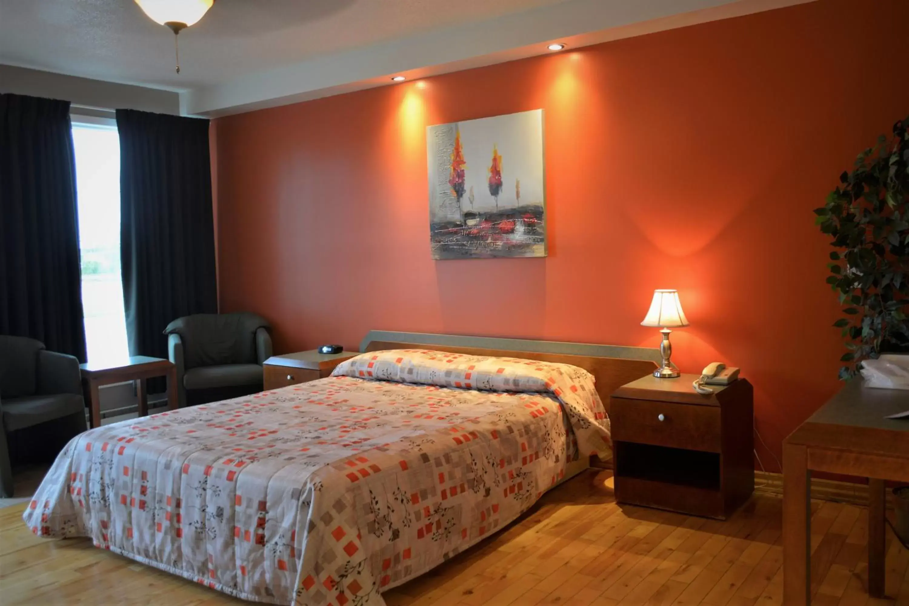 Bed, Room Photo in Motel Quatre Saisons