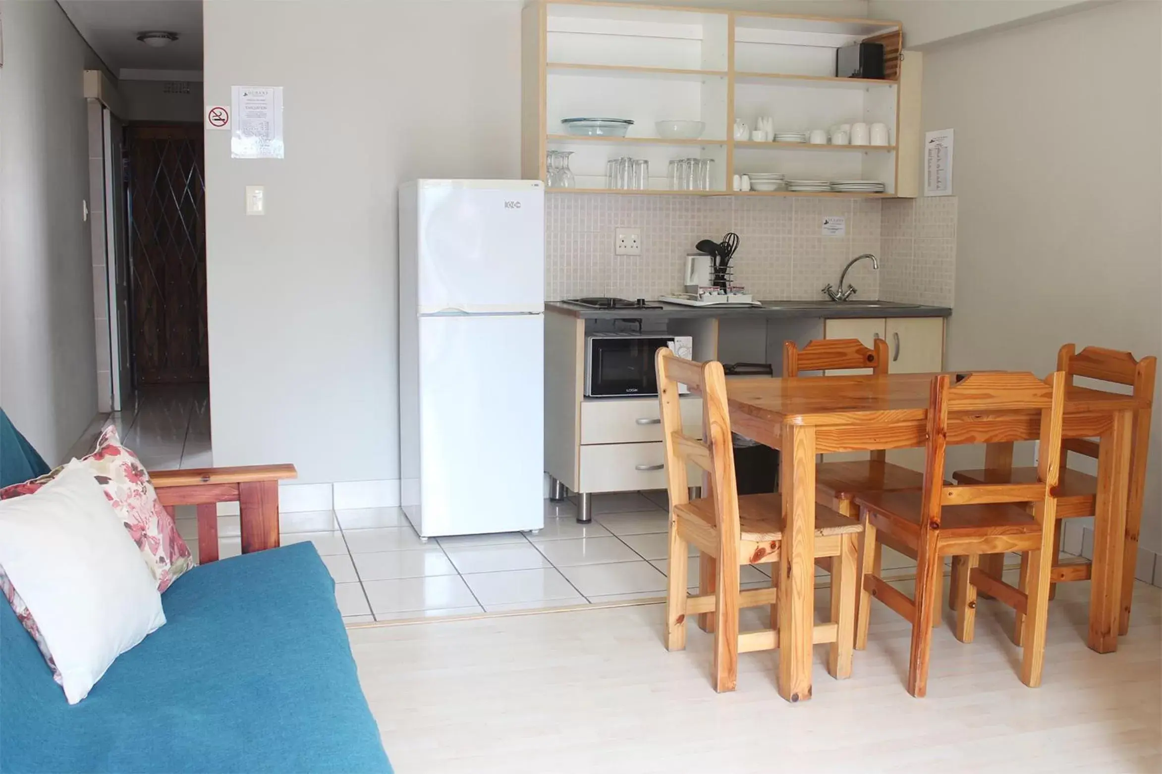 Kitchen or kitchenette, Dining Area in Oceans Hotel & Self Catering