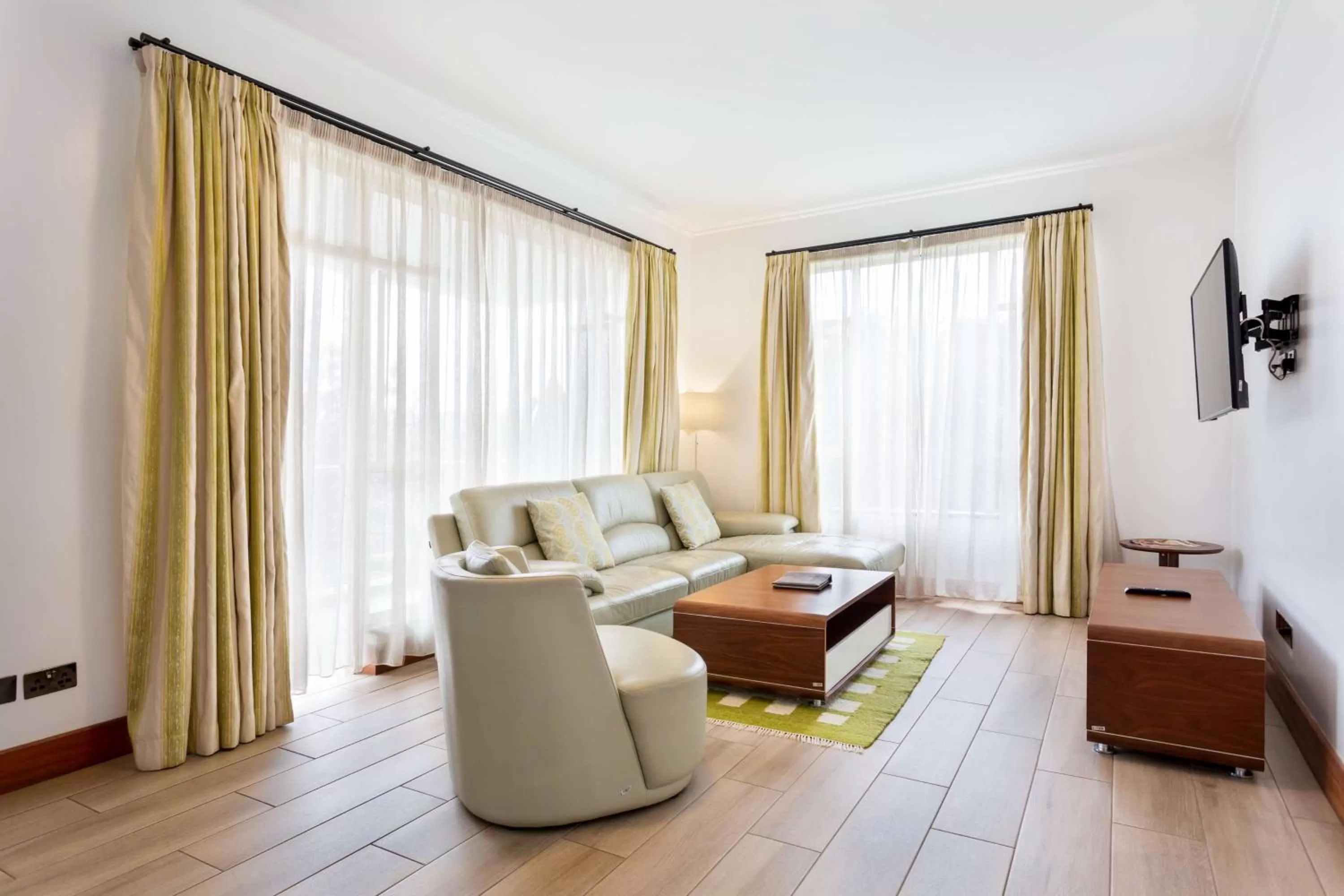 Living room in Executive Residency by Best Western Nairobi