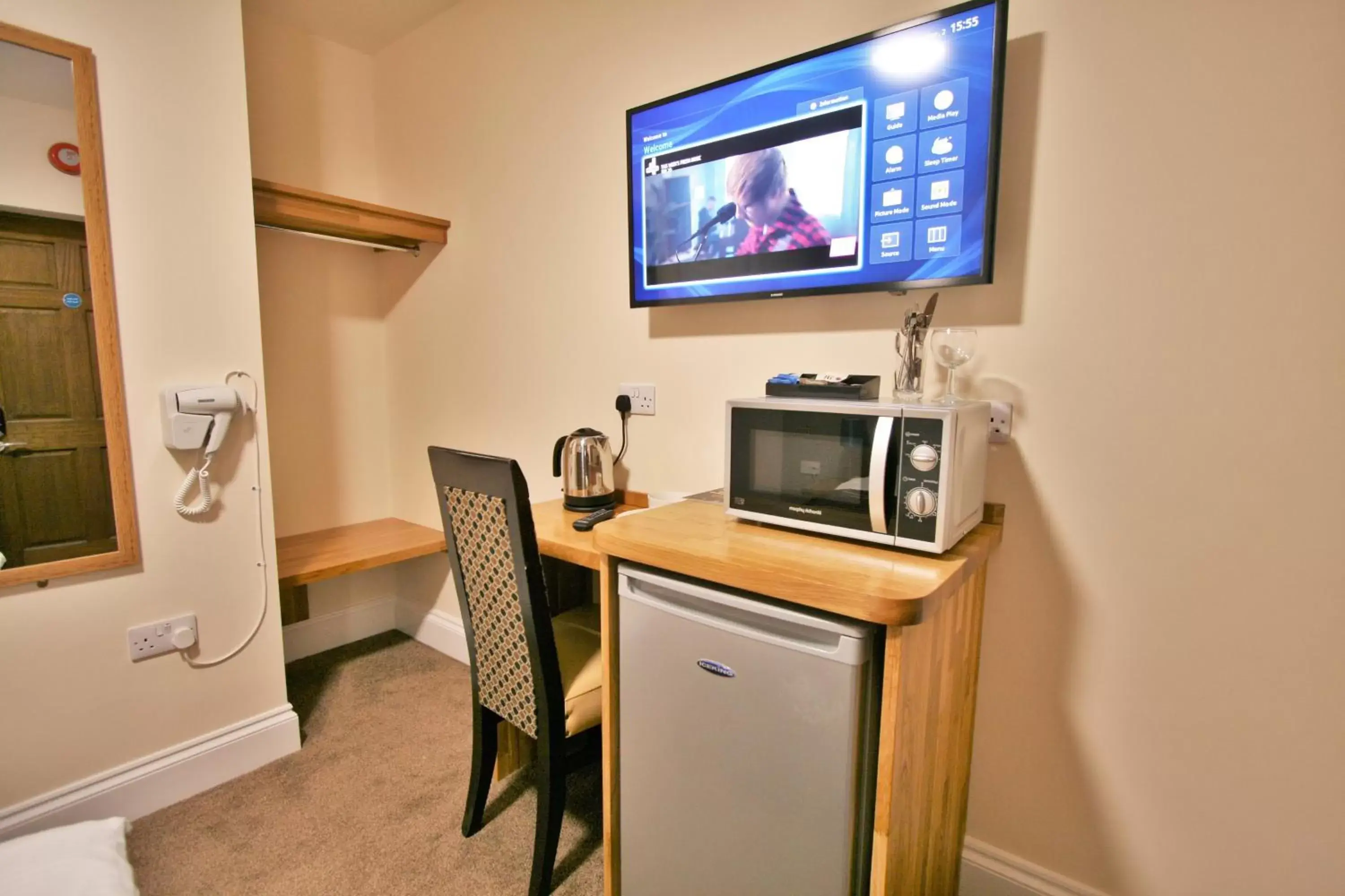 TV and multimedia, TV/Entertainment Center in New County Hotel & Serviced Apartments by RoomsBooked