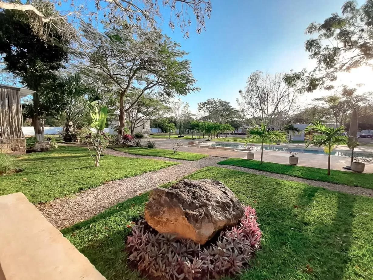 Garden, Swimming Pool in Hotel Casa de Campo Conkal Merida