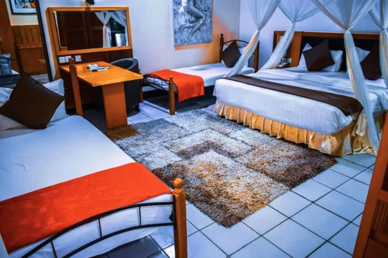 Photo of the whole room, Bed in Jangwani Sea Breeze Resort