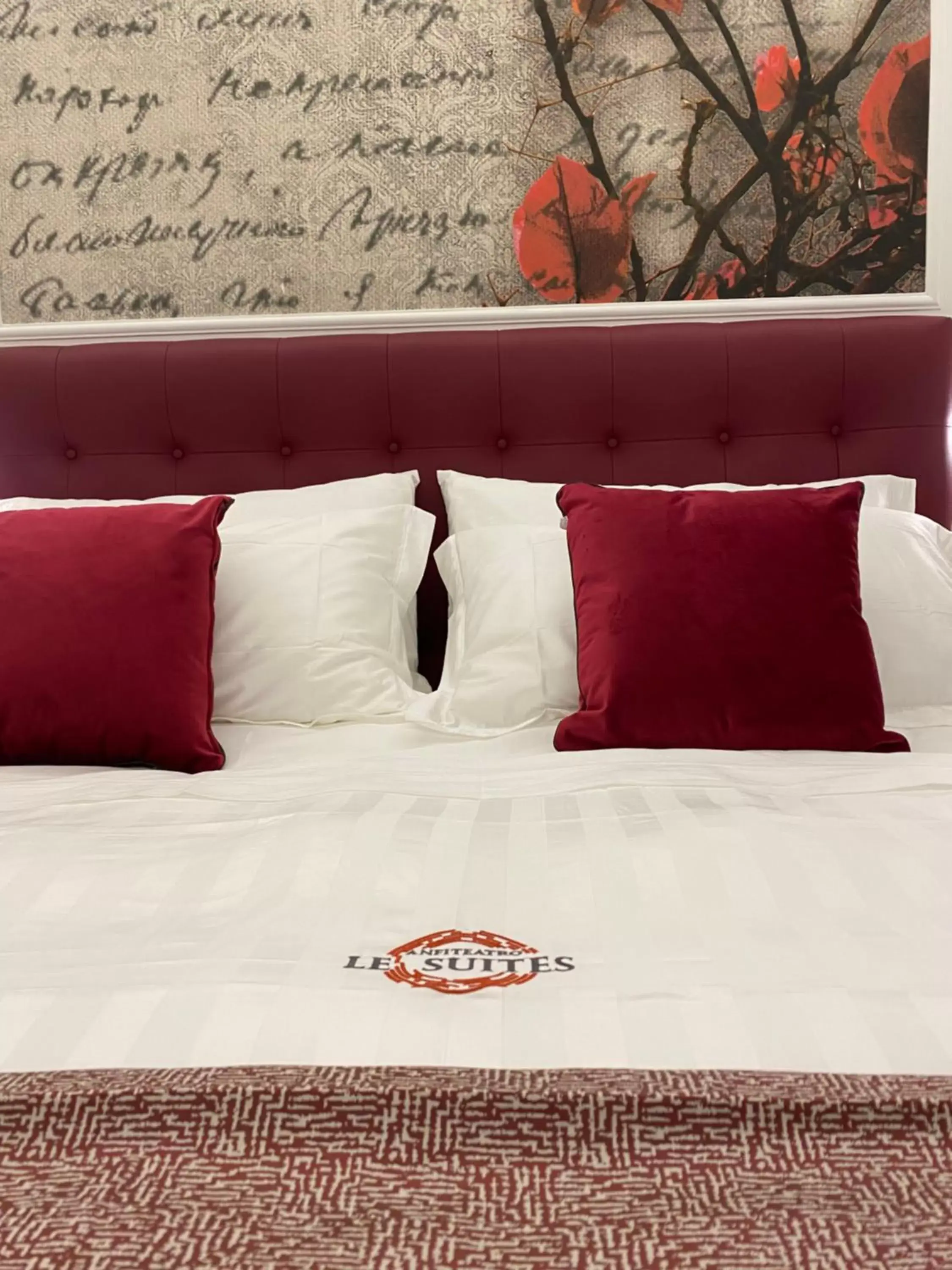 Bed in ANFITEATRO LE SUITES