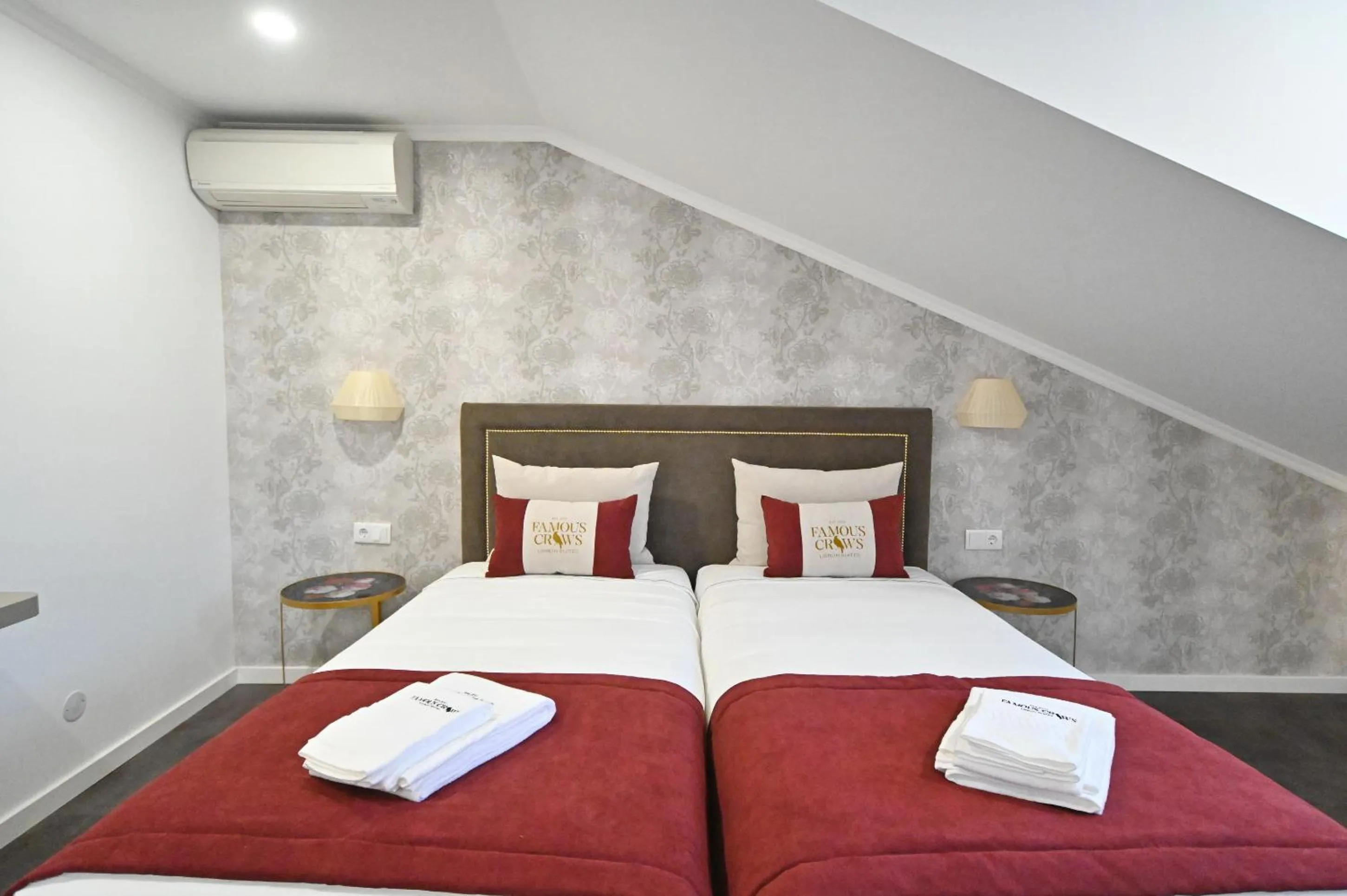 Bed in Famous Crows Lisbon Suites