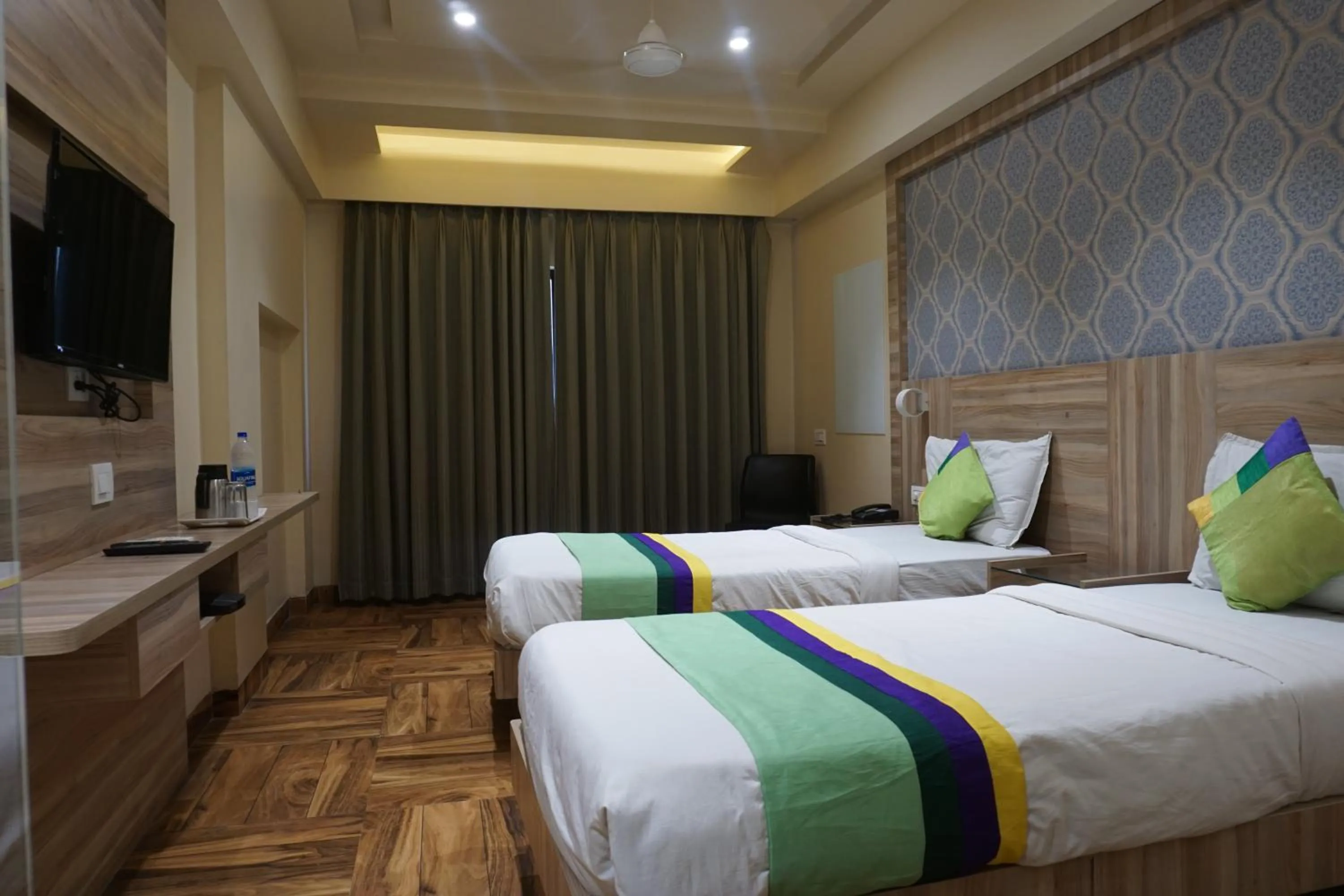 Bedroom, Bed in Treebo Classic Grande, Camp