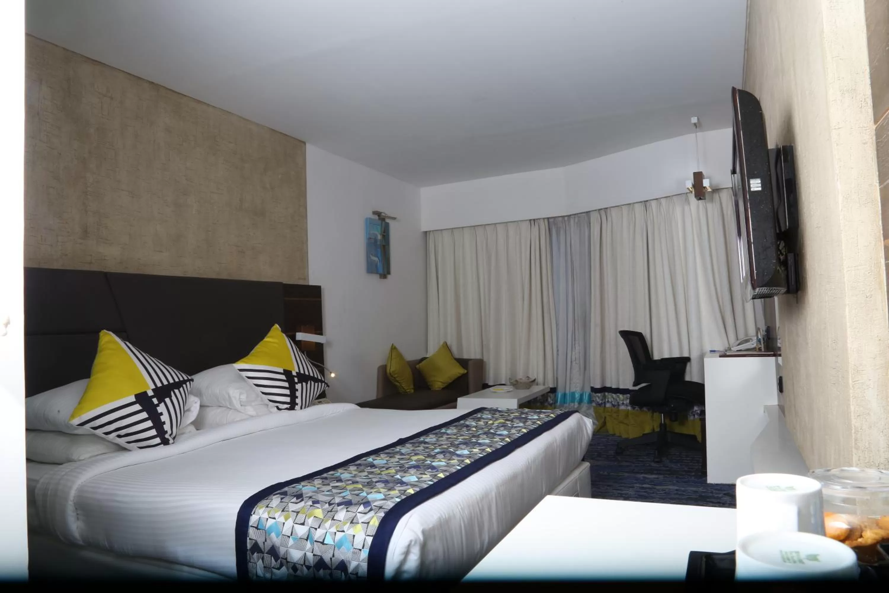 Living room, Bed in Sayaji Indore