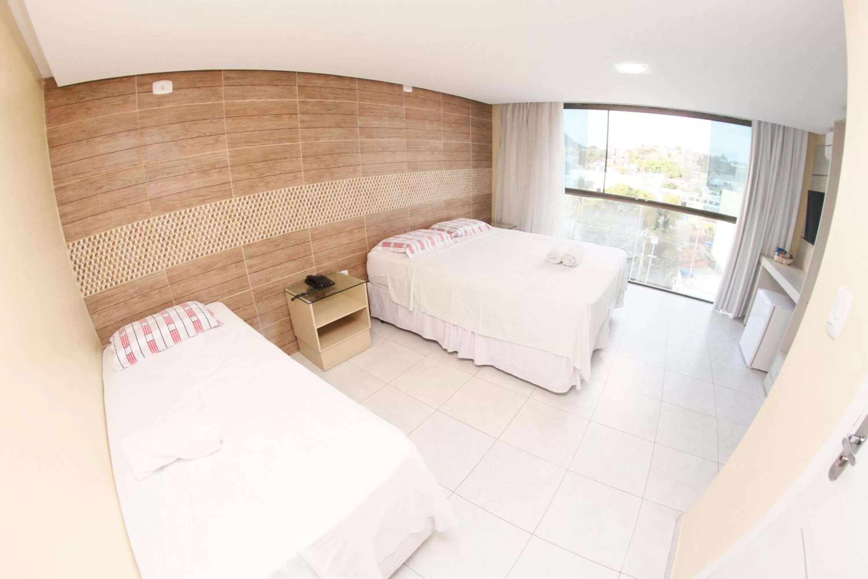 Photo of the whole room, Bed in LW Hotel