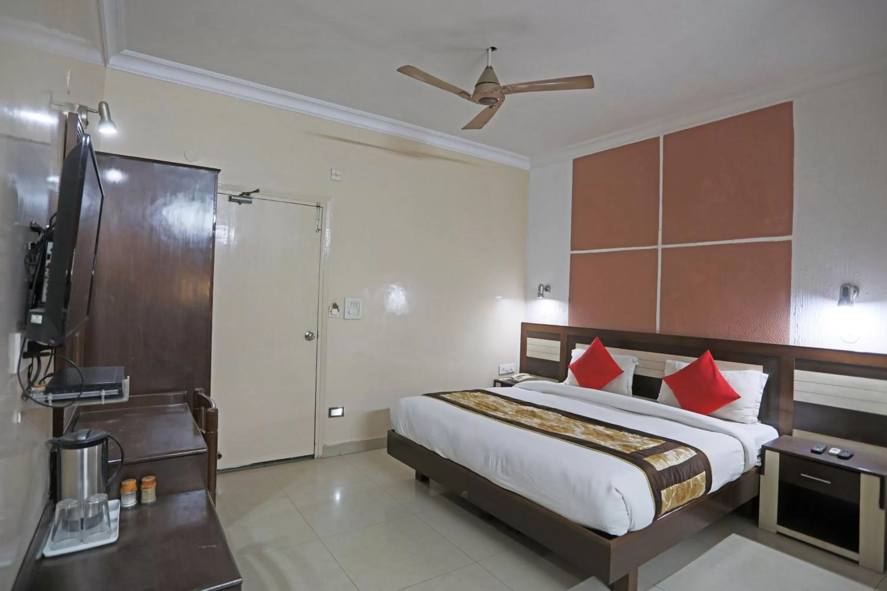Photo of the whole room in Hotel The Tourist - 1 min from New Delhi Railway Station