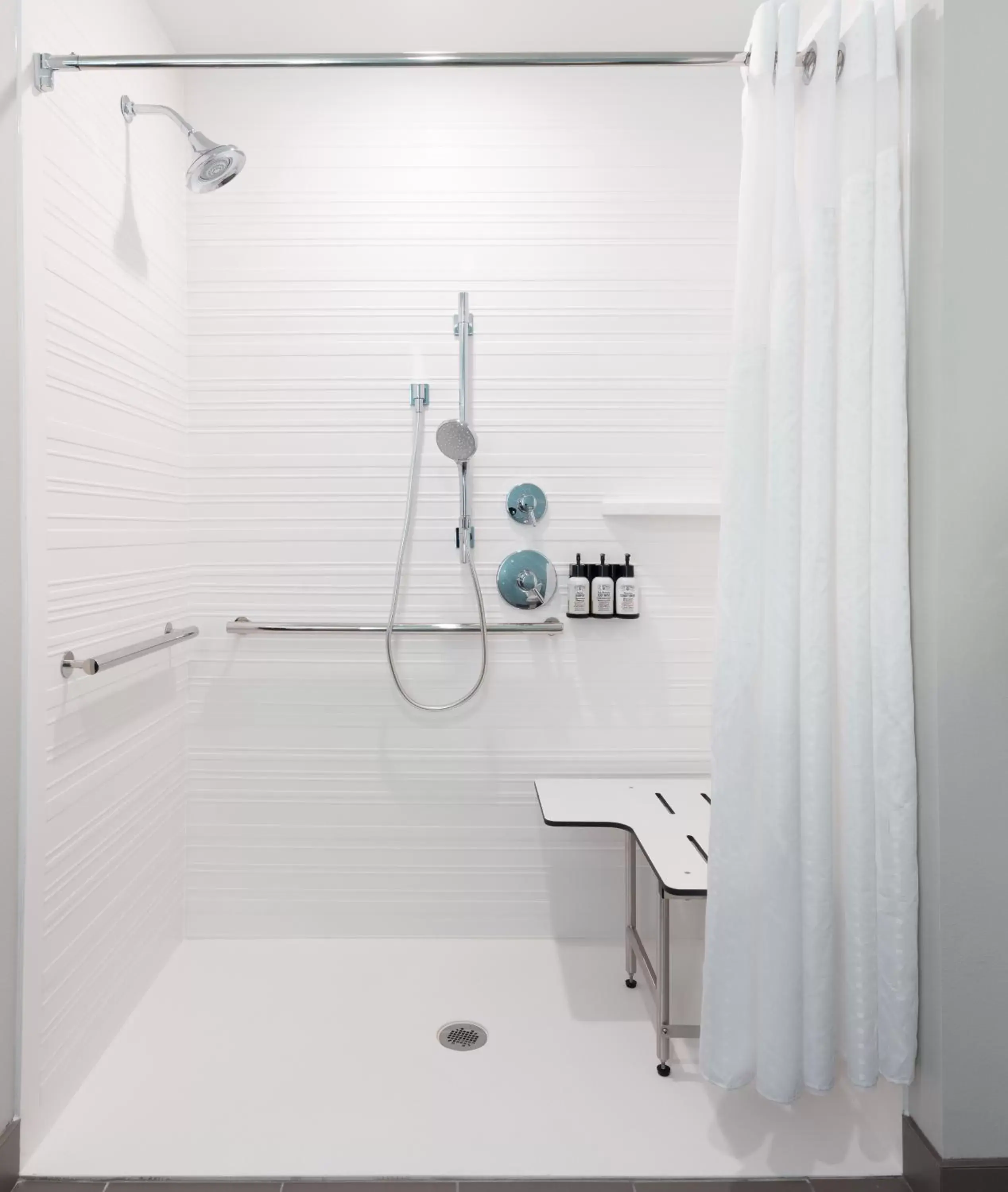 Shower, Bathroom in avid hotels - Madison - Monona, an IHG Hotel