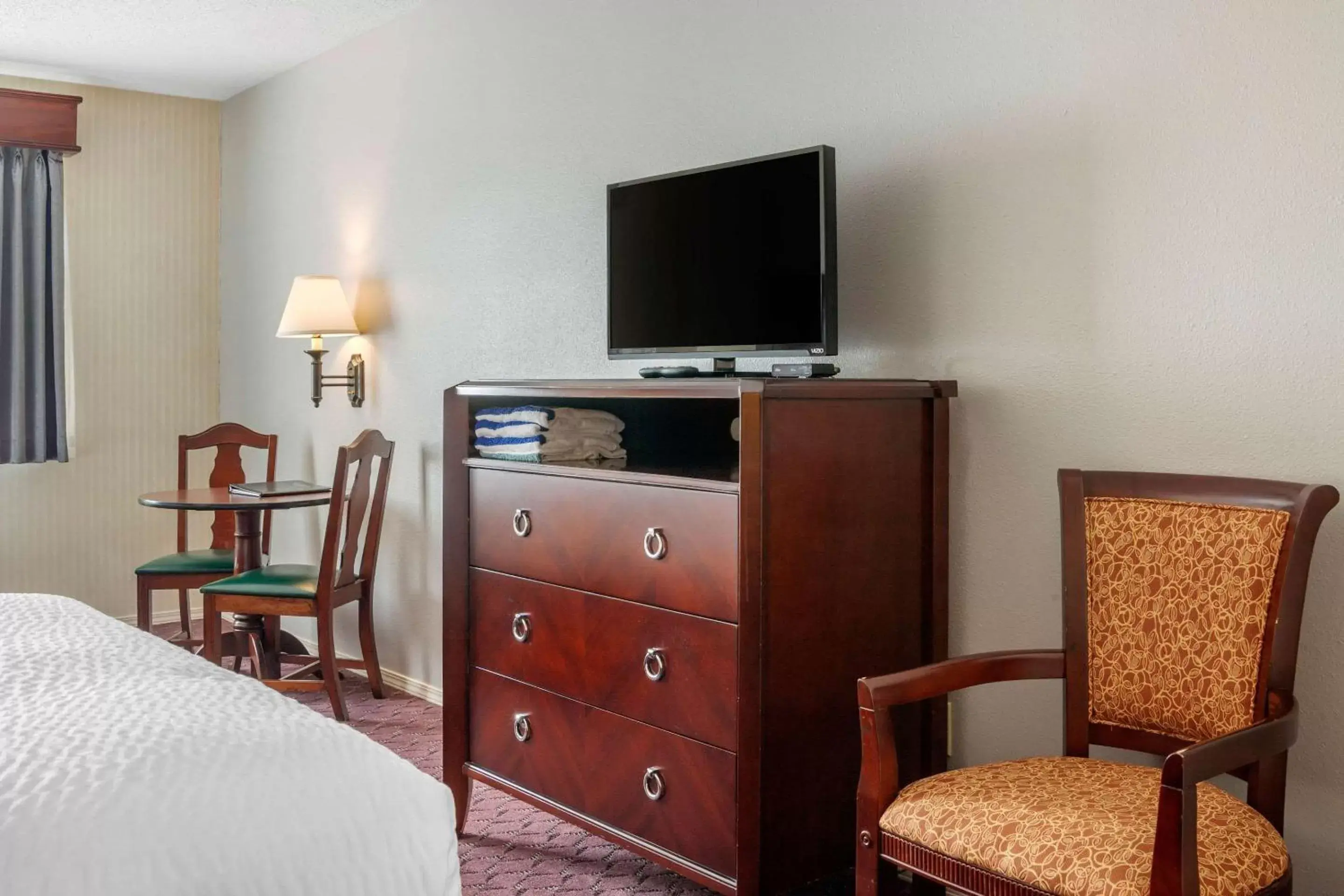 Photo of the whole room, TV/Entertainment Center in Clarion Hotel & Suites