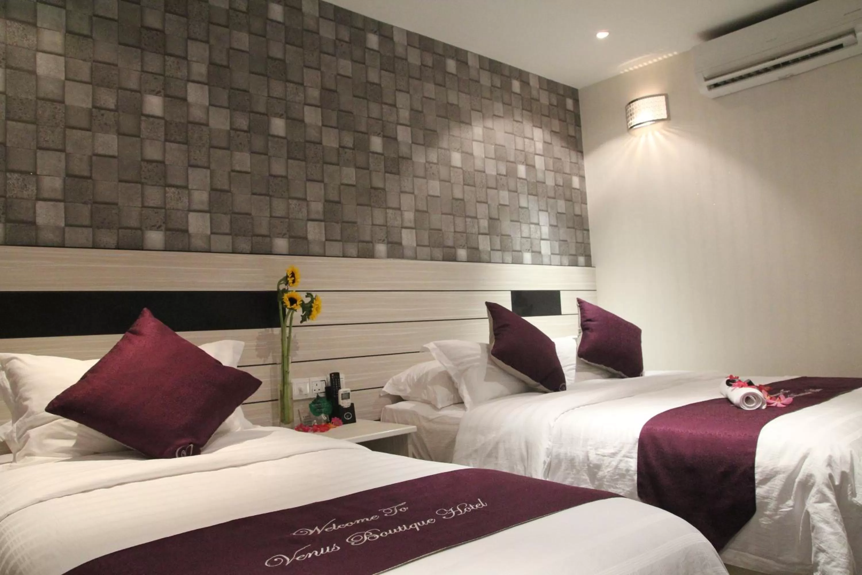 Bed in Venus Boutique Hotel