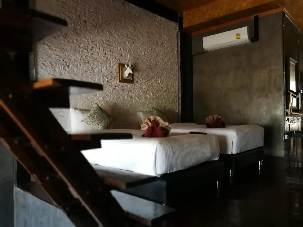 Bed in Aen Guy Boutique Hotel