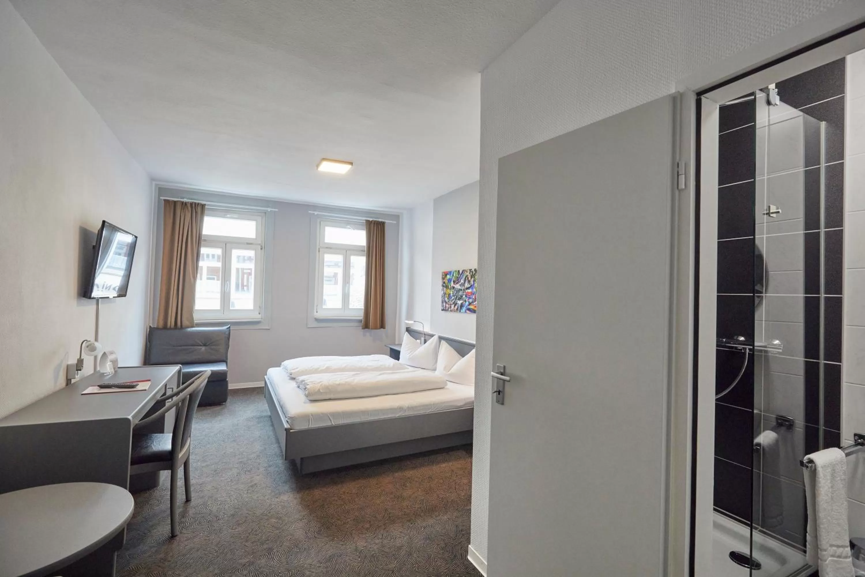 Photo of the whole room, Bed in Hotel Schlemmer Das familäre Altstadt - Hotel mit Herz