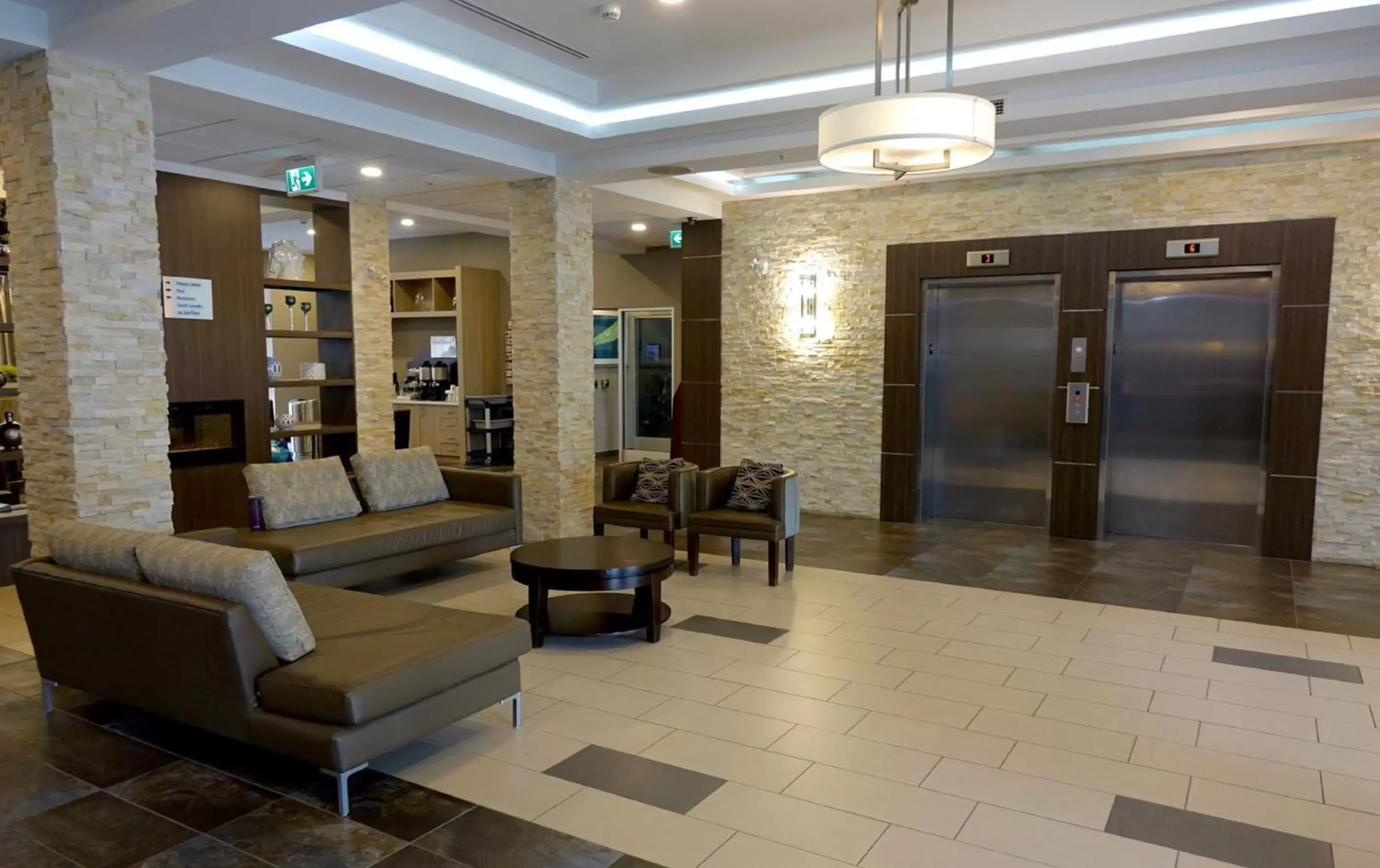 Property building, Lobby/Reception in Holiday Inn Express & Suites Oshawa Downtown - Toronto Area, an IHG Hotel