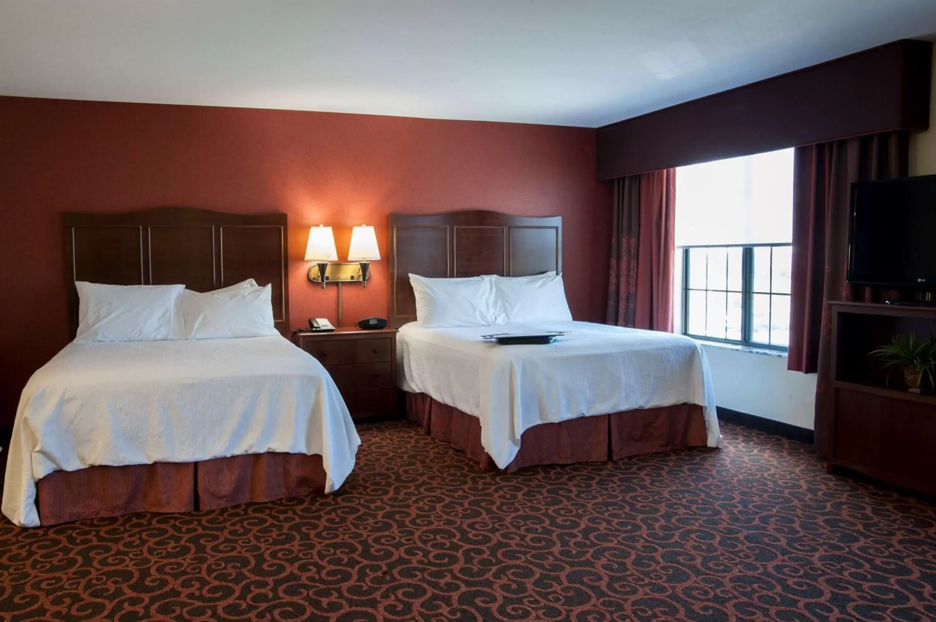 Bed in Hampton Inn & Suites Watertown