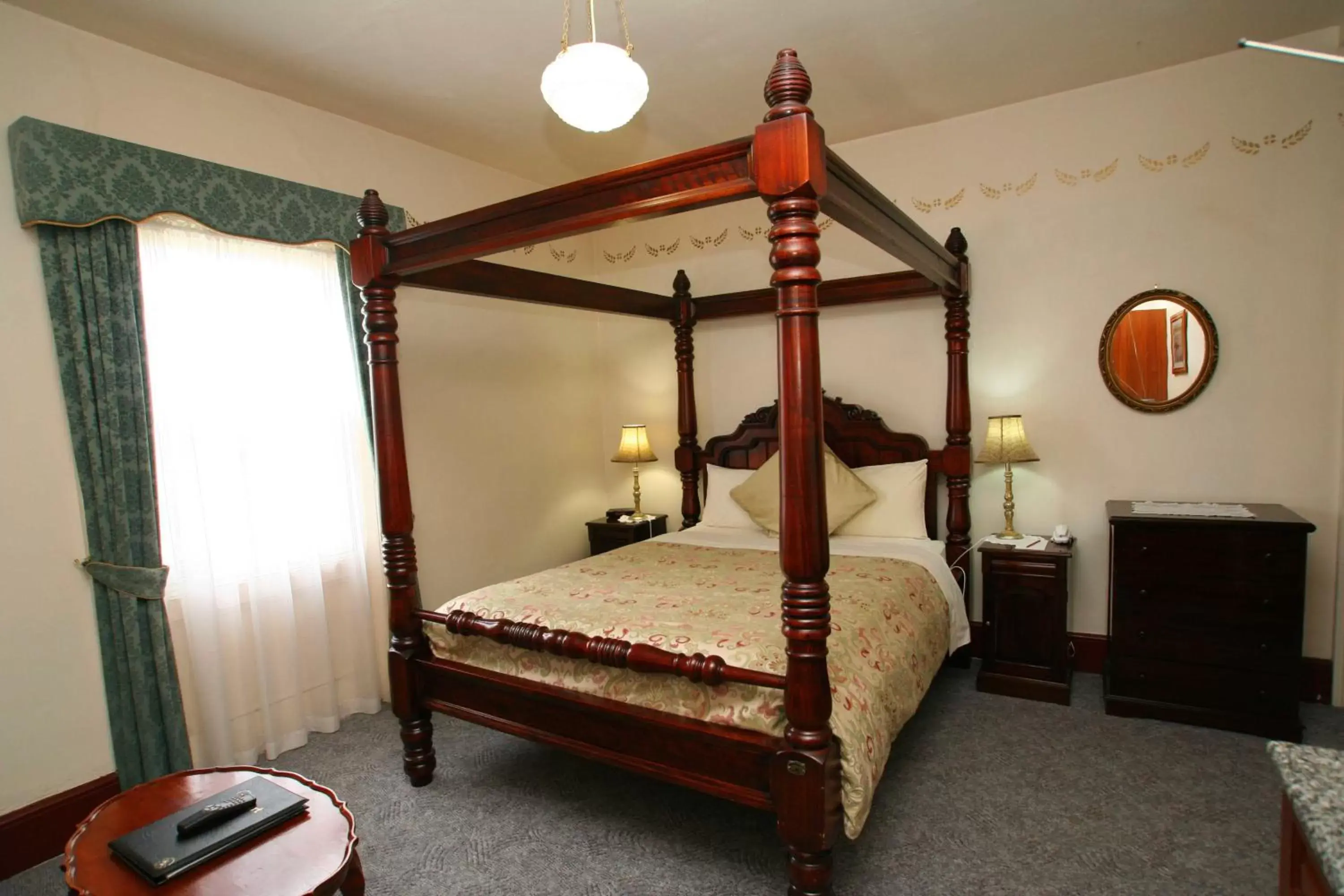Bed in The Lodge on Elizabeth Boutique Hotel