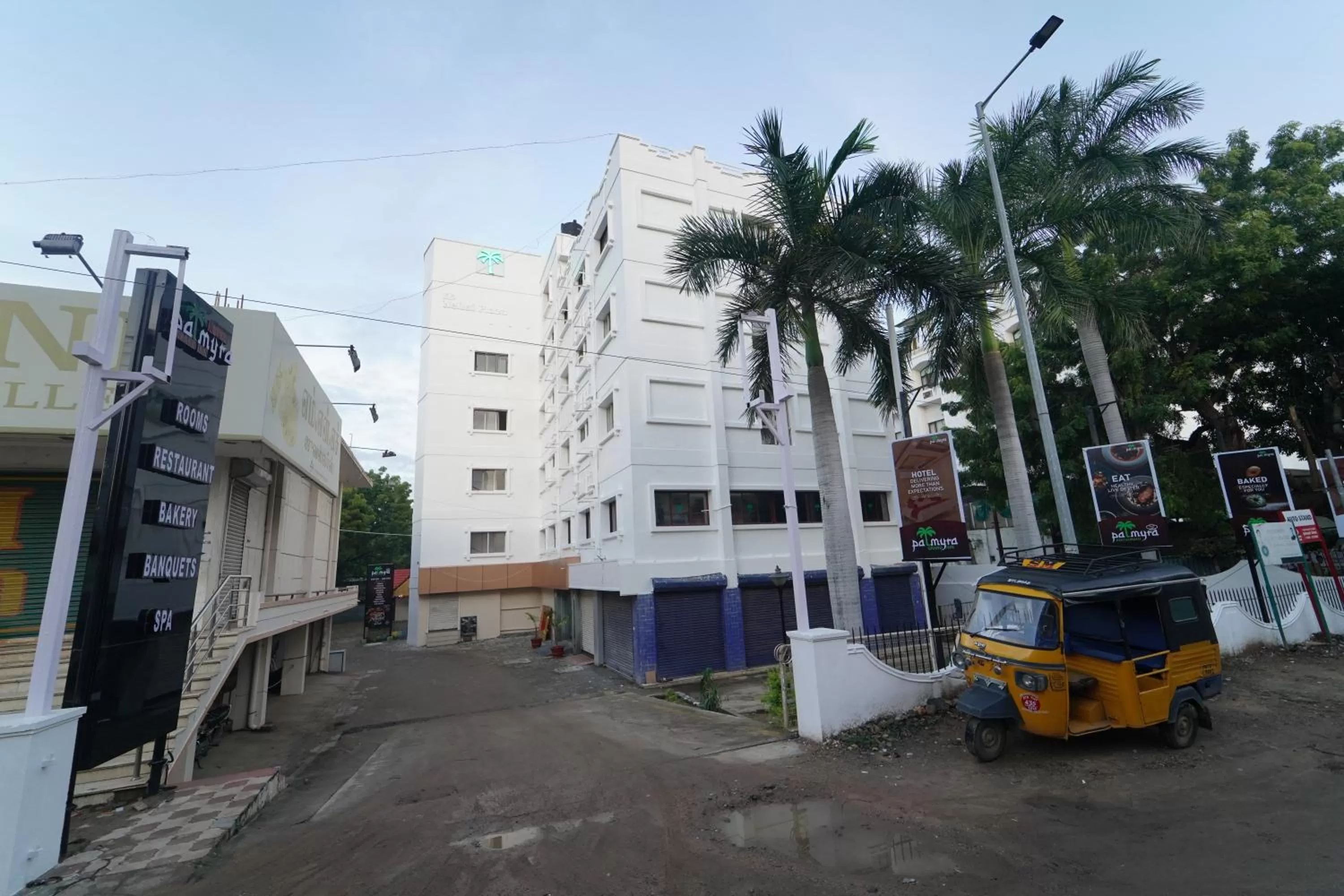 Property building in Hotel Palmyra Grand Inn