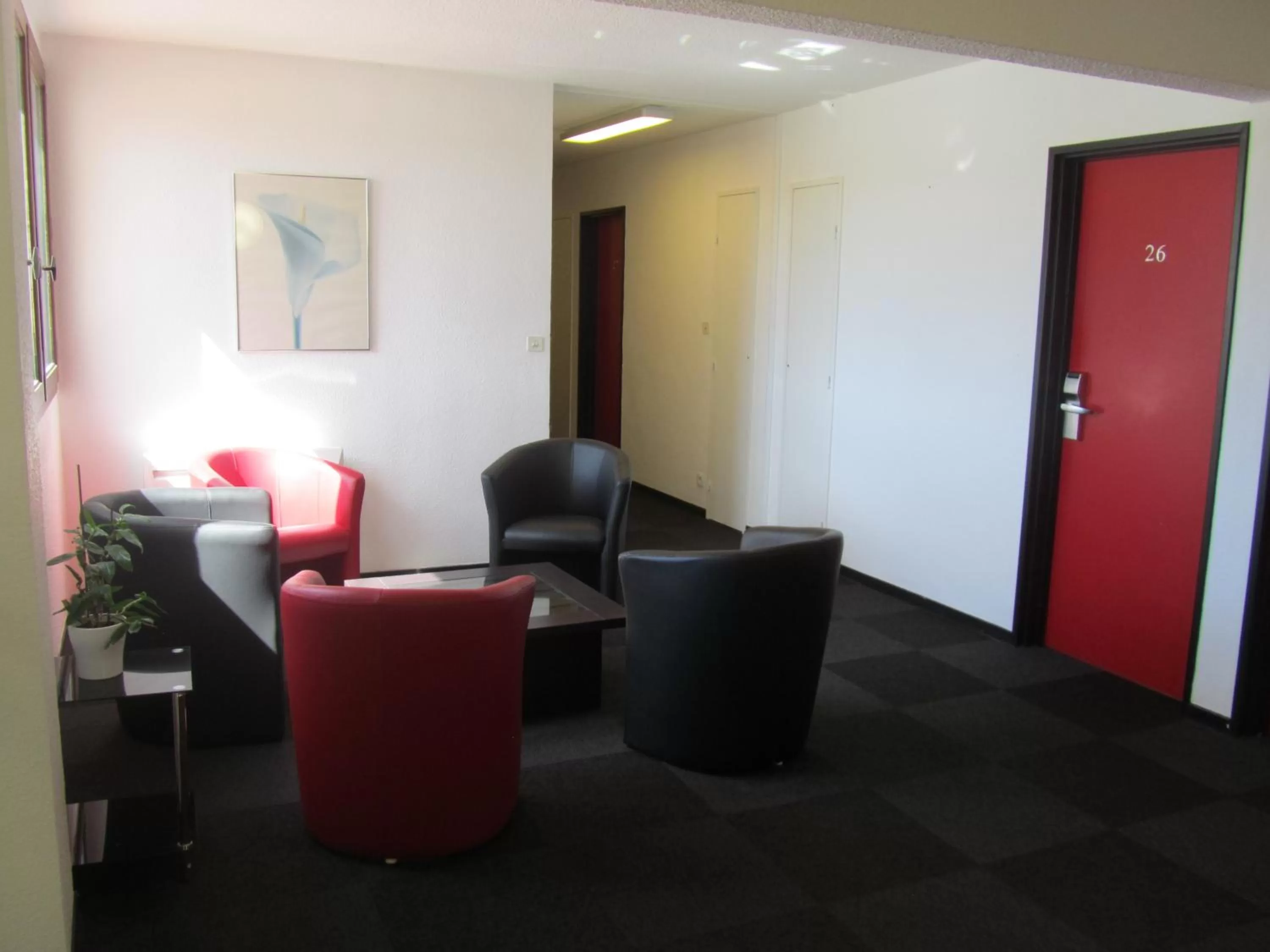 Communal lounge/ TV room, Seating Area in Hôtel - Restaurant Le Saint Joseph