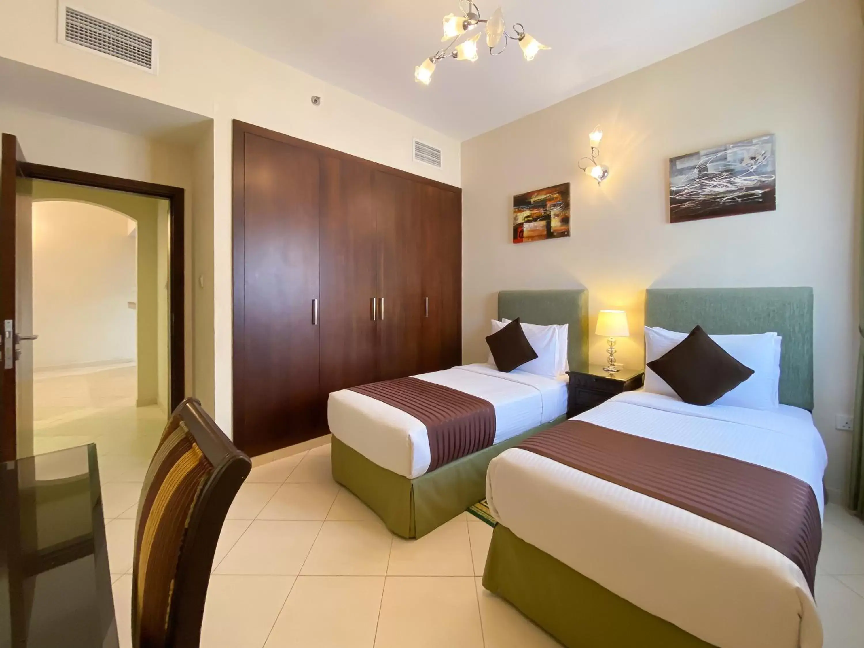 Bed in Auris Boutique Hotel Apartments - AlBarsha