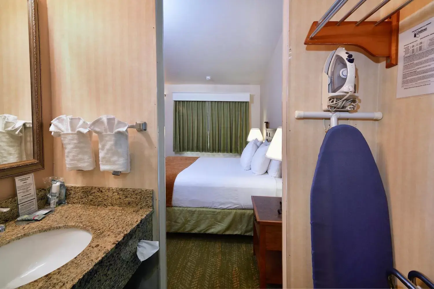 Bed in Lamplighter Inn & Suites at SDSU