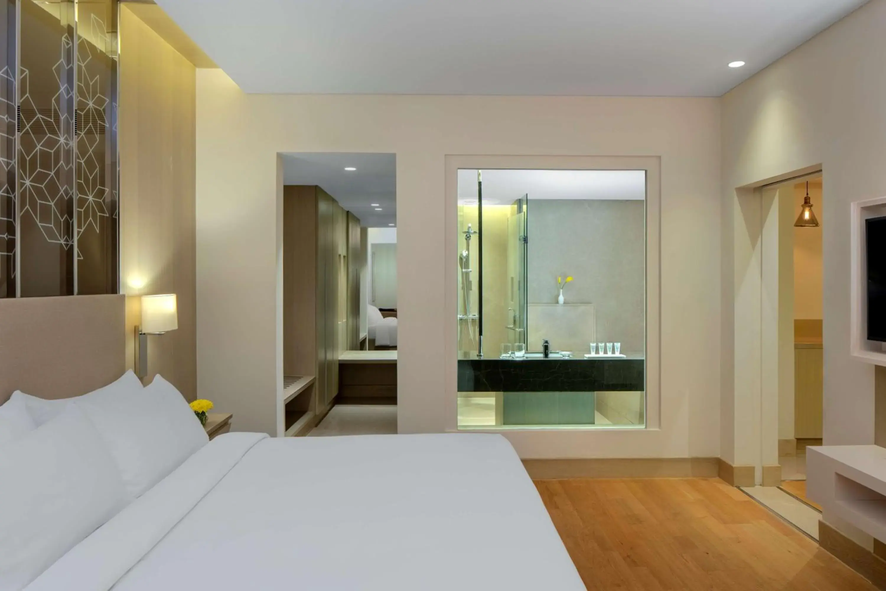 Bathroom, Bed in Radisson Gurugram Udyog Vihar