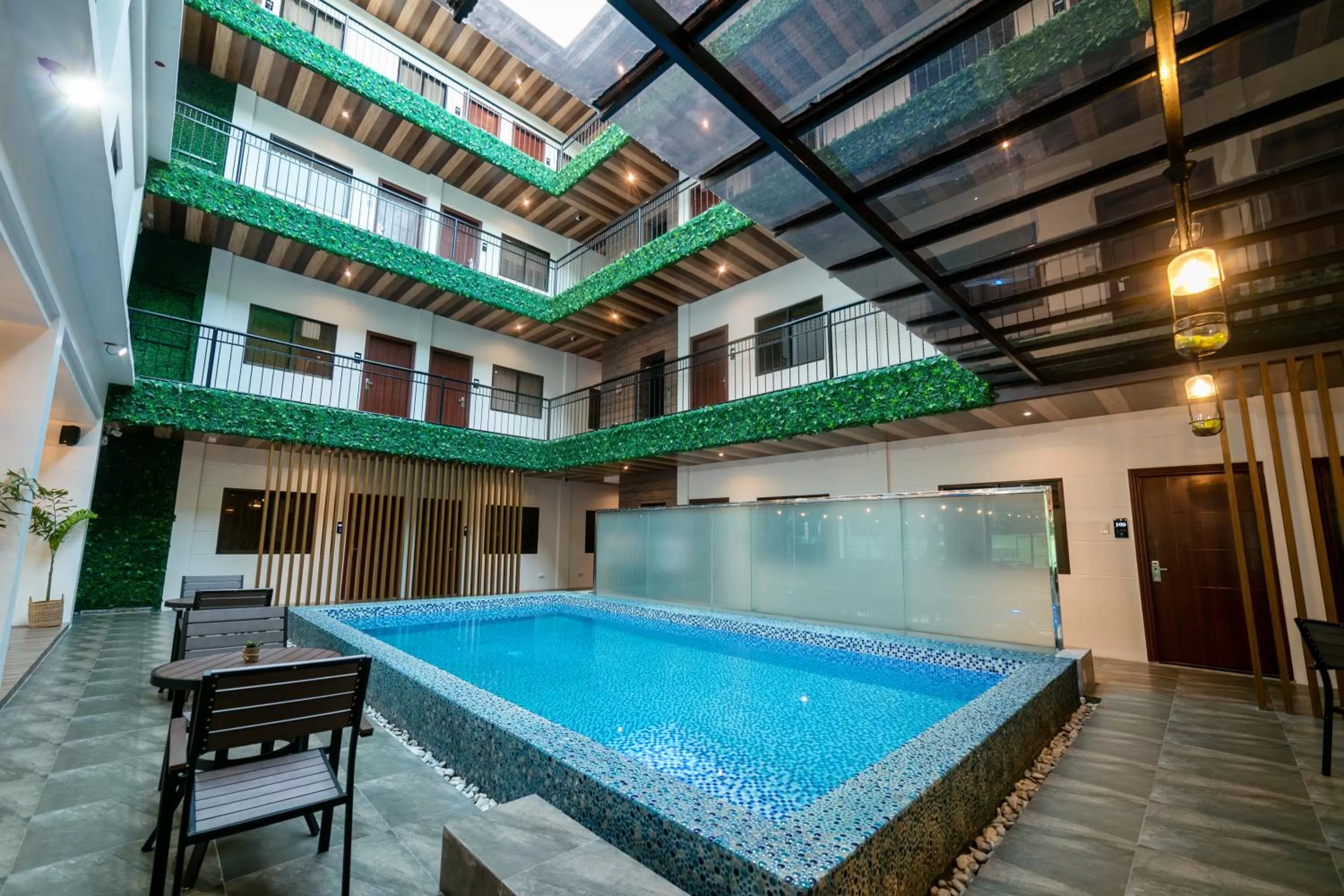 Property building in SureStay Plus Hotel by Best Western AC LUXE Angeles City