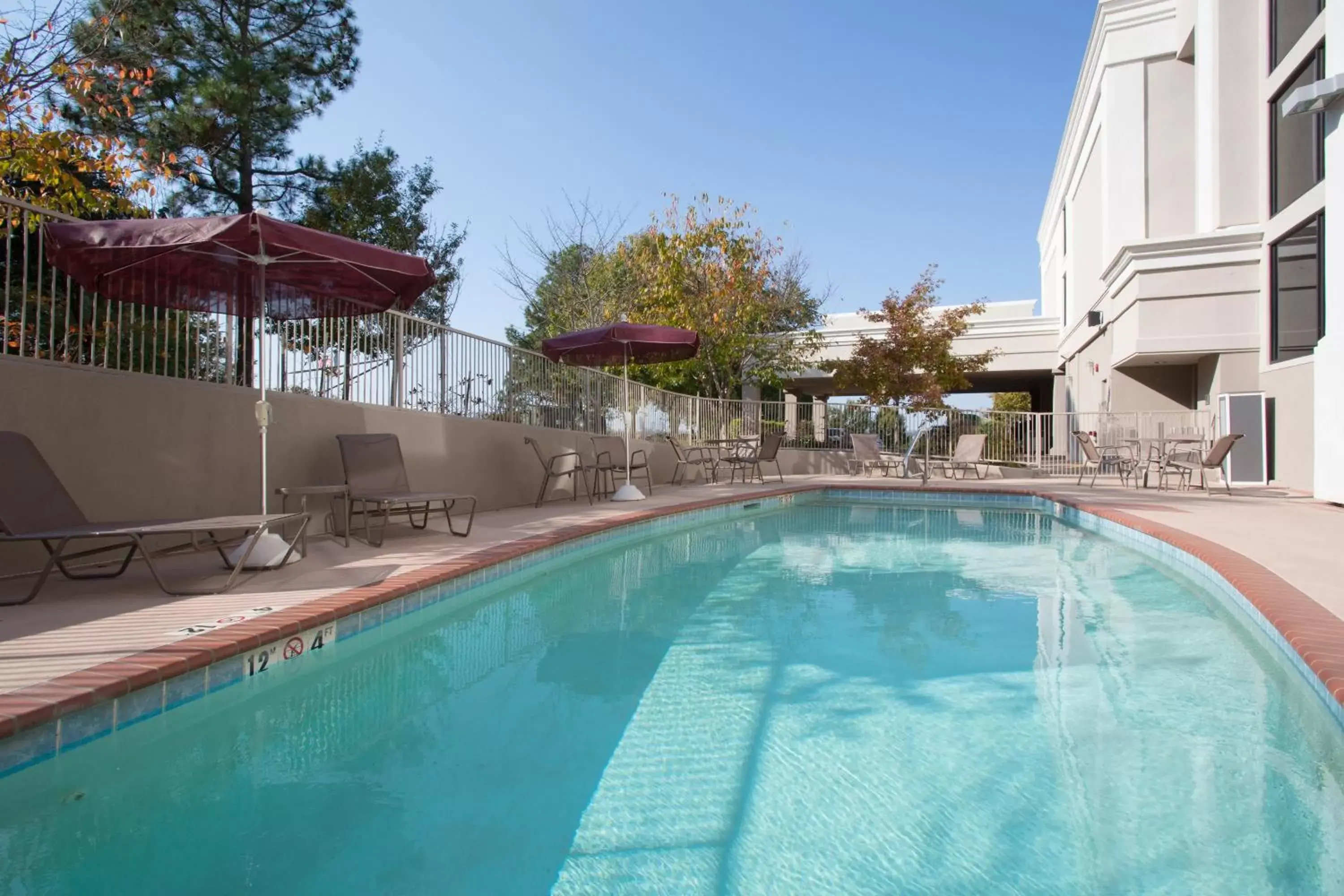 Swimming Pool in Holiday Inn Little Rock-Airport-Conference Center, an IHG Hotel