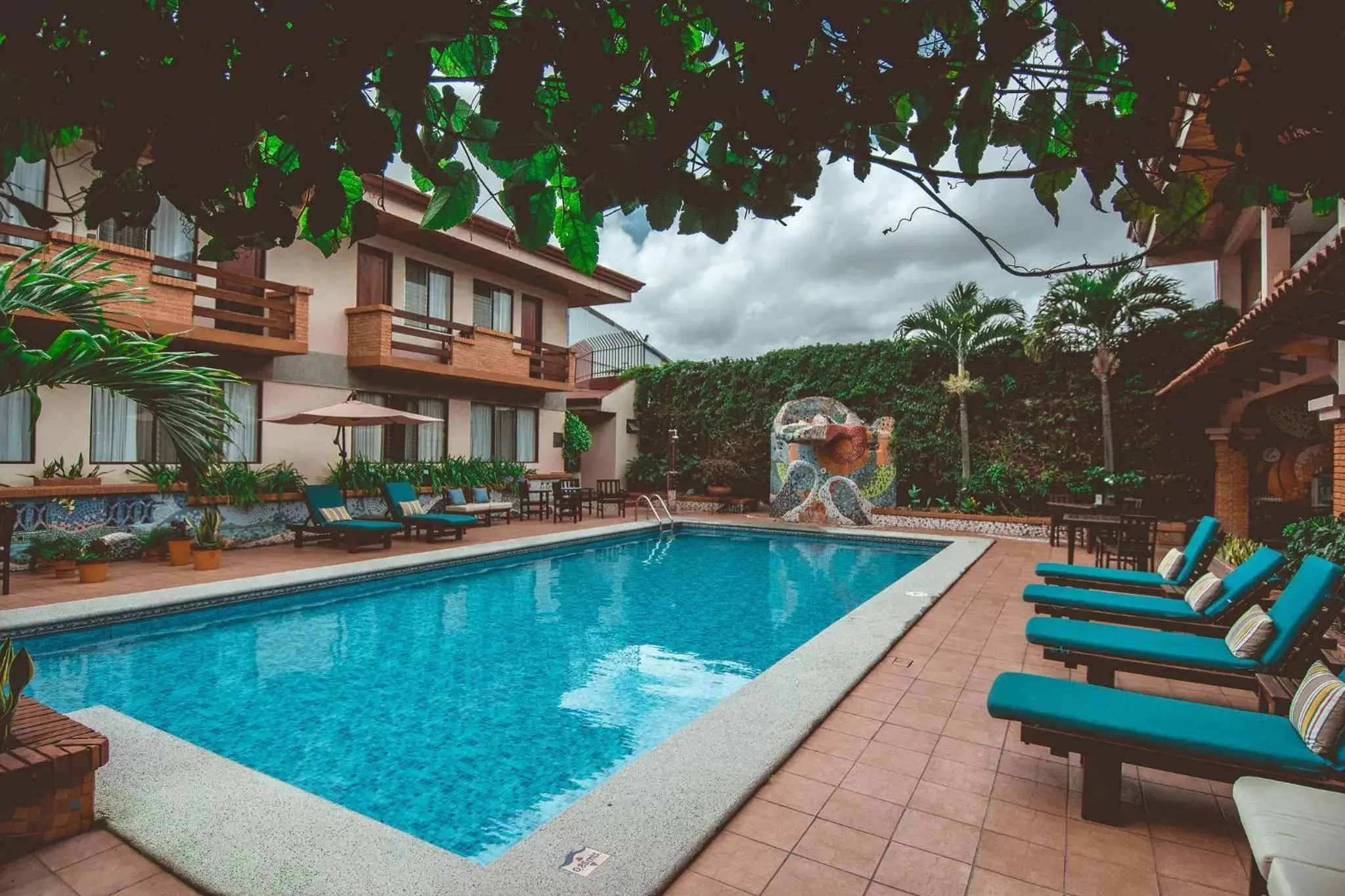 Swimming Pool in La Sabana Hotel Suites Apartments